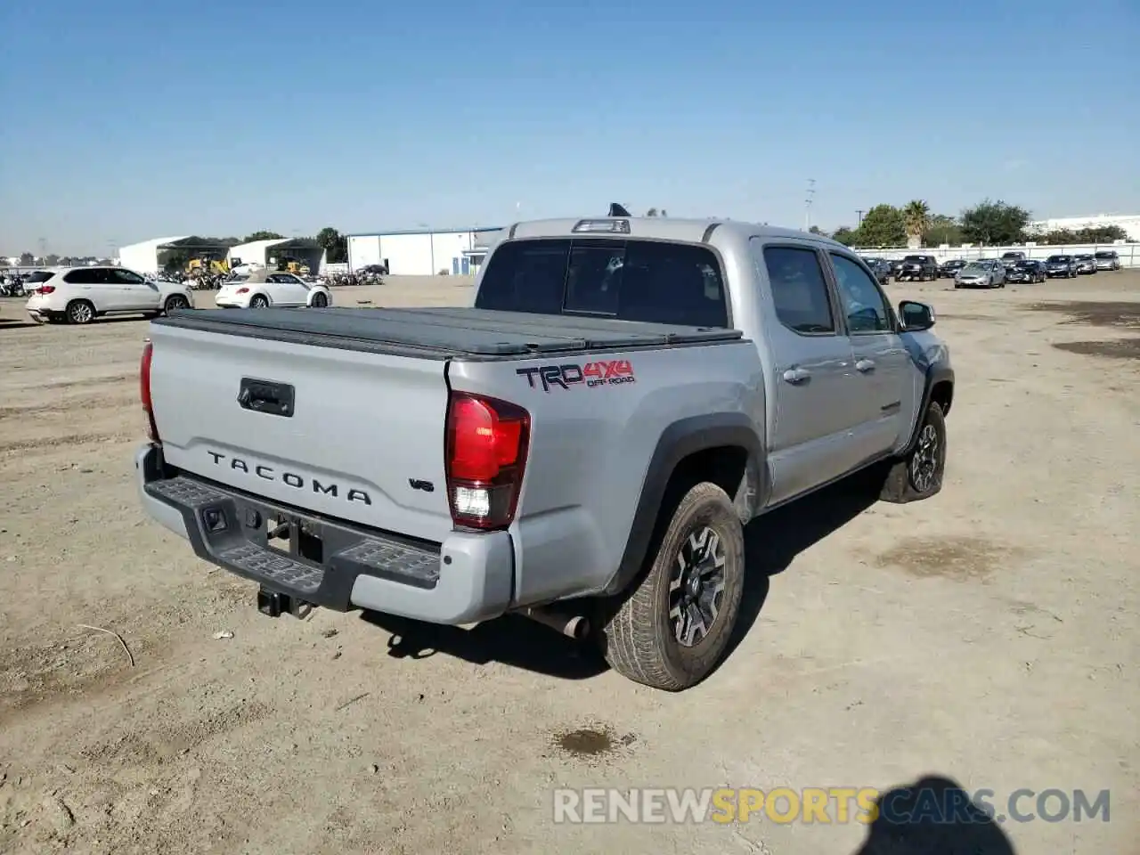 4 Photograph of a damaged car 3TMCZ5AN3KM273394 TOYOTA TACOMA 2019