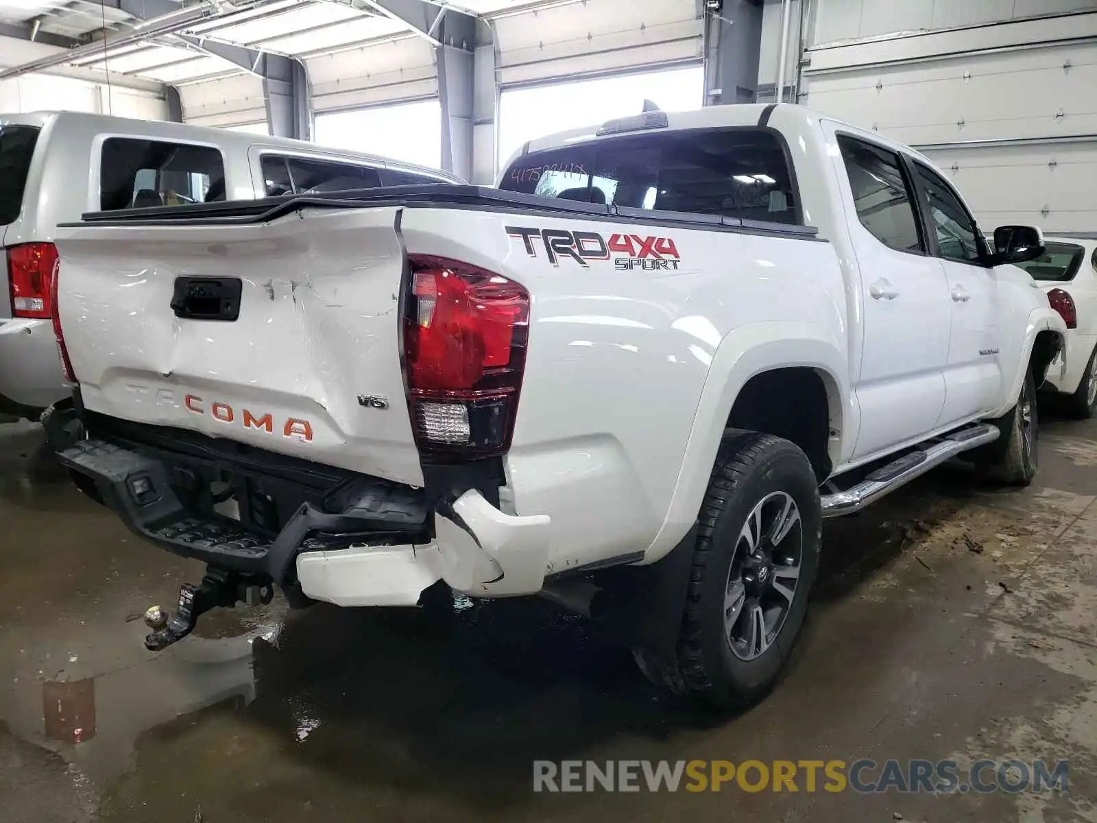 4 Photograph of a damaged car 3TMCZ5AN3KM276991 TOYOTA TACOMA 2019