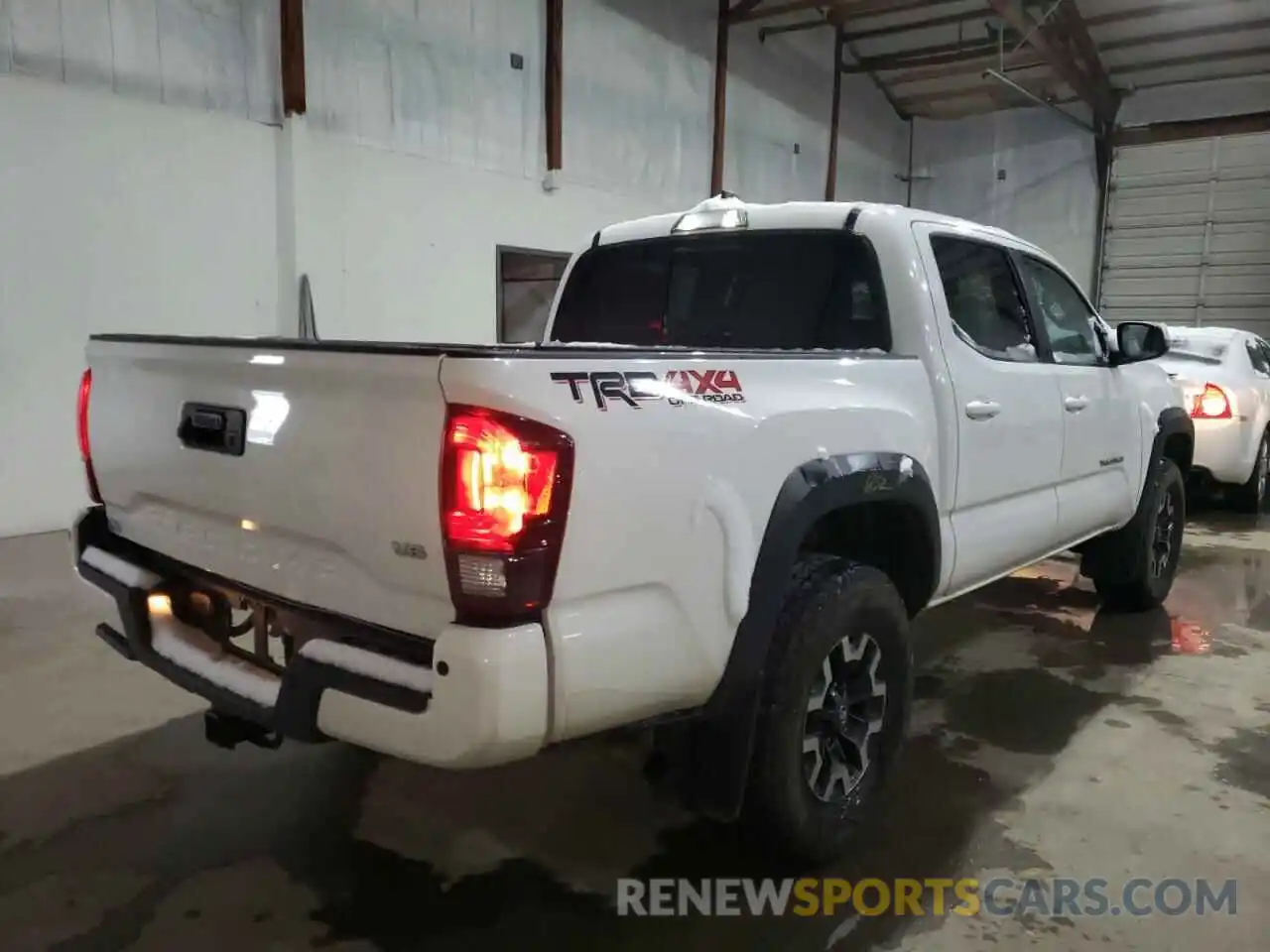 4 Photograph of a damaged car 3TMCZ5AN3KM282726 TOYOTA TACOMA 2019