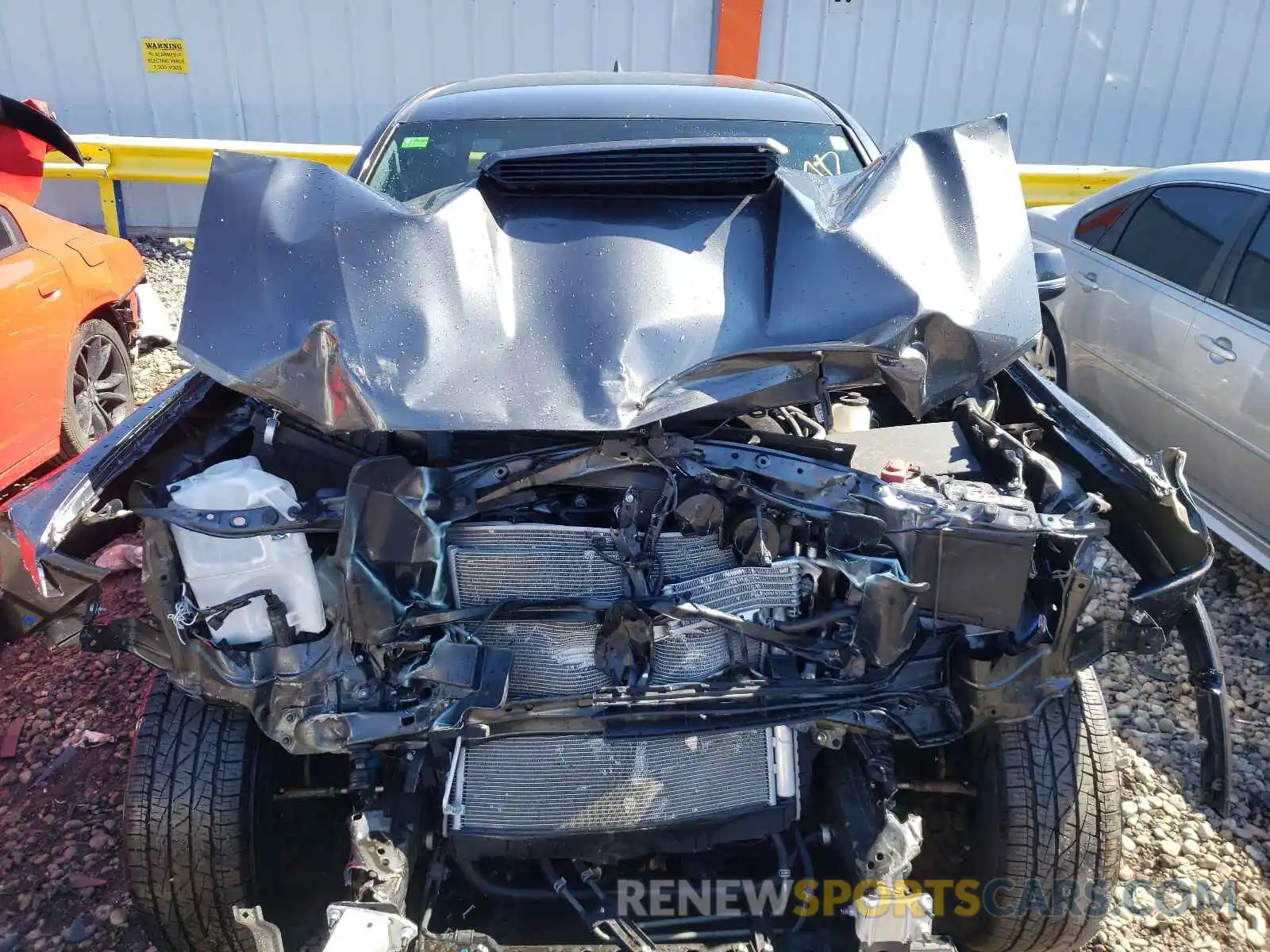 7 Photograph of a damaged car 3TMCZ5AN3KM283584 TOYOTA TACOMA 2019