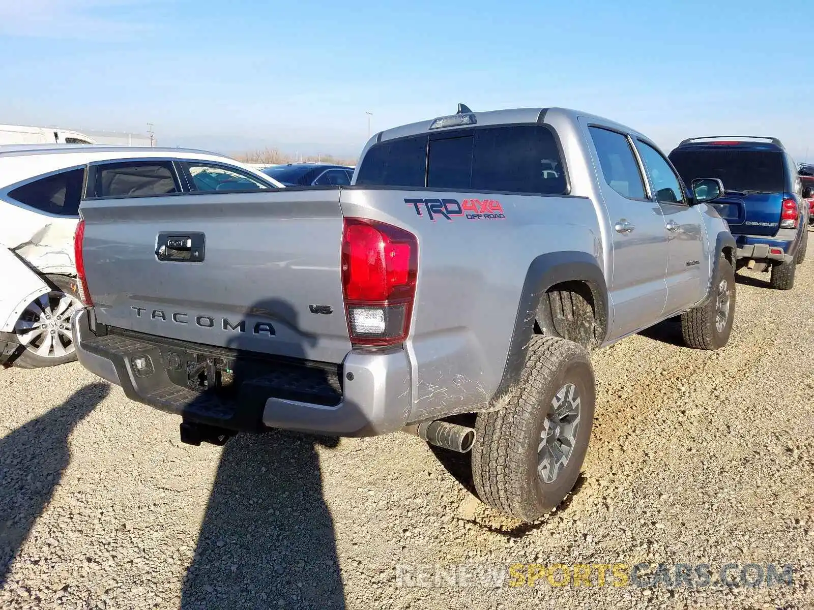 4 Photograph of a damaged car 3TMCZ5AN3KM284718 TOYOTA TACOMA 2019