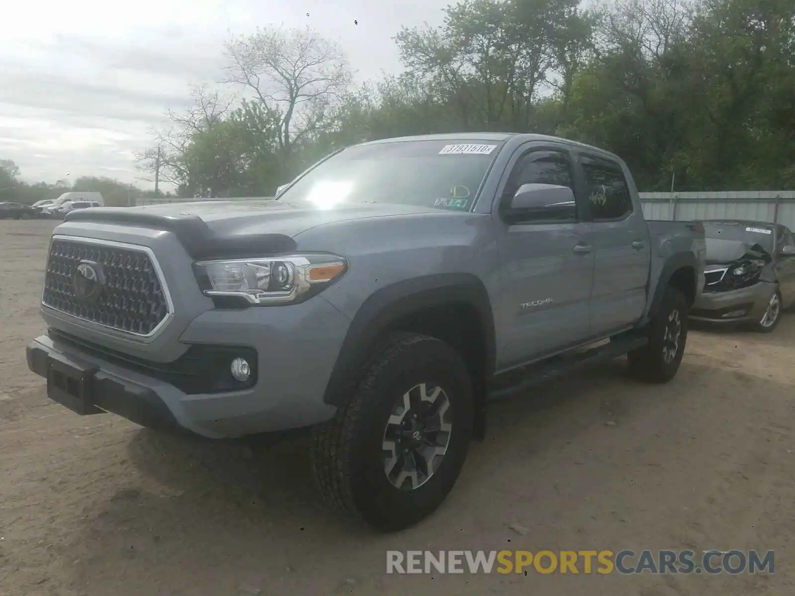 2 Photograph of a damaged car 3TMCZ5AN3KM285576 TOYOTA TACOMA 2019