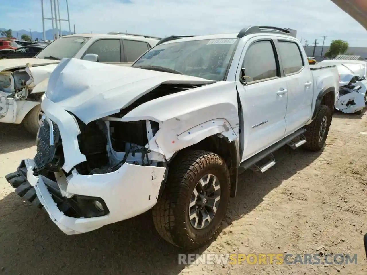 2 Photograph of a damaged car 3TMCZ5AN3KM288140 TOYOTA TACOMA 2019