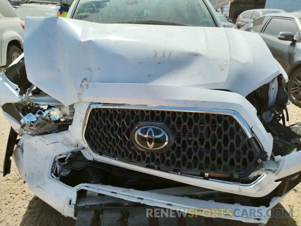 7 Photograph of a damaged car 3TMCZ5AN3KM288140 TOYOTA TACOMA 2019