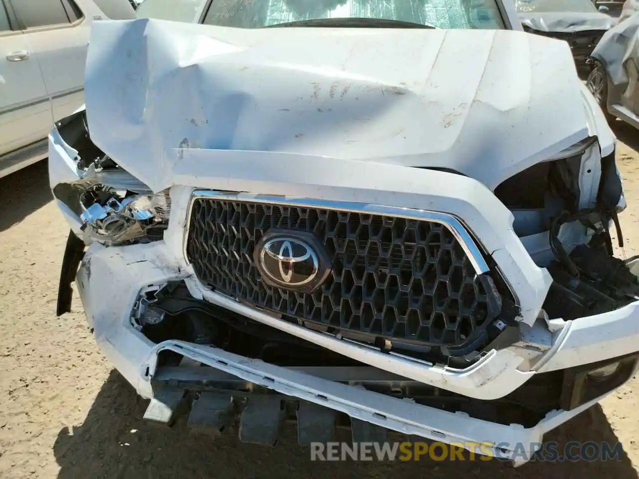 9 Photograph of a damaged car 3TMCZ5AN3KM288140 TOYOTA TACOMA 2019