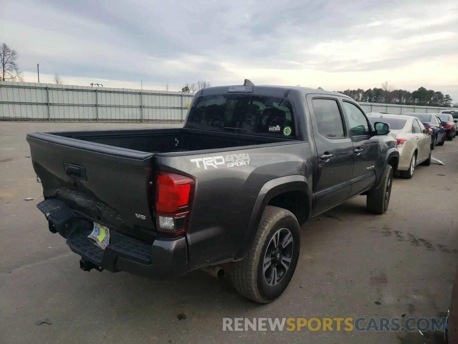 4 Photograph of a damaged car 3TMCZ5AN4KM191724 TOYOTA TACOMA 2019