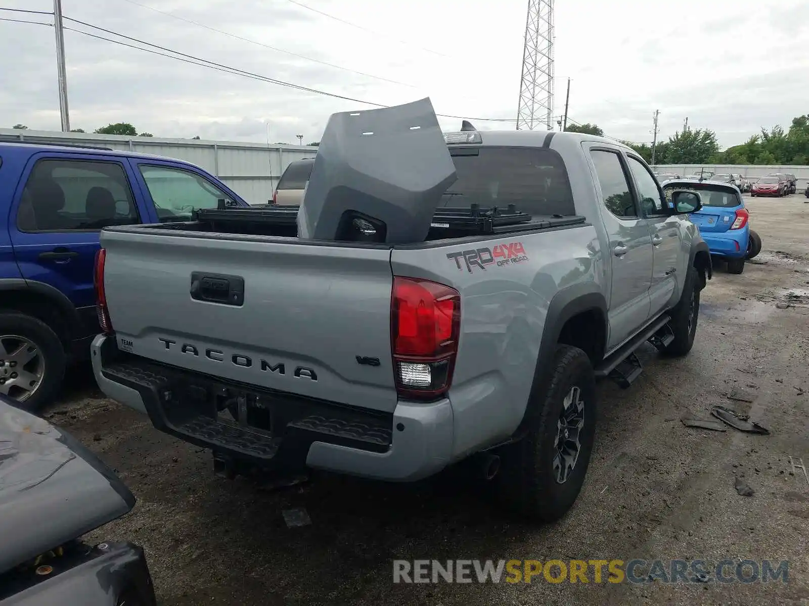 4 Photograph of a damaged car 3TMCZ5AN4KM192078 TOYOTA TACOMA 2019