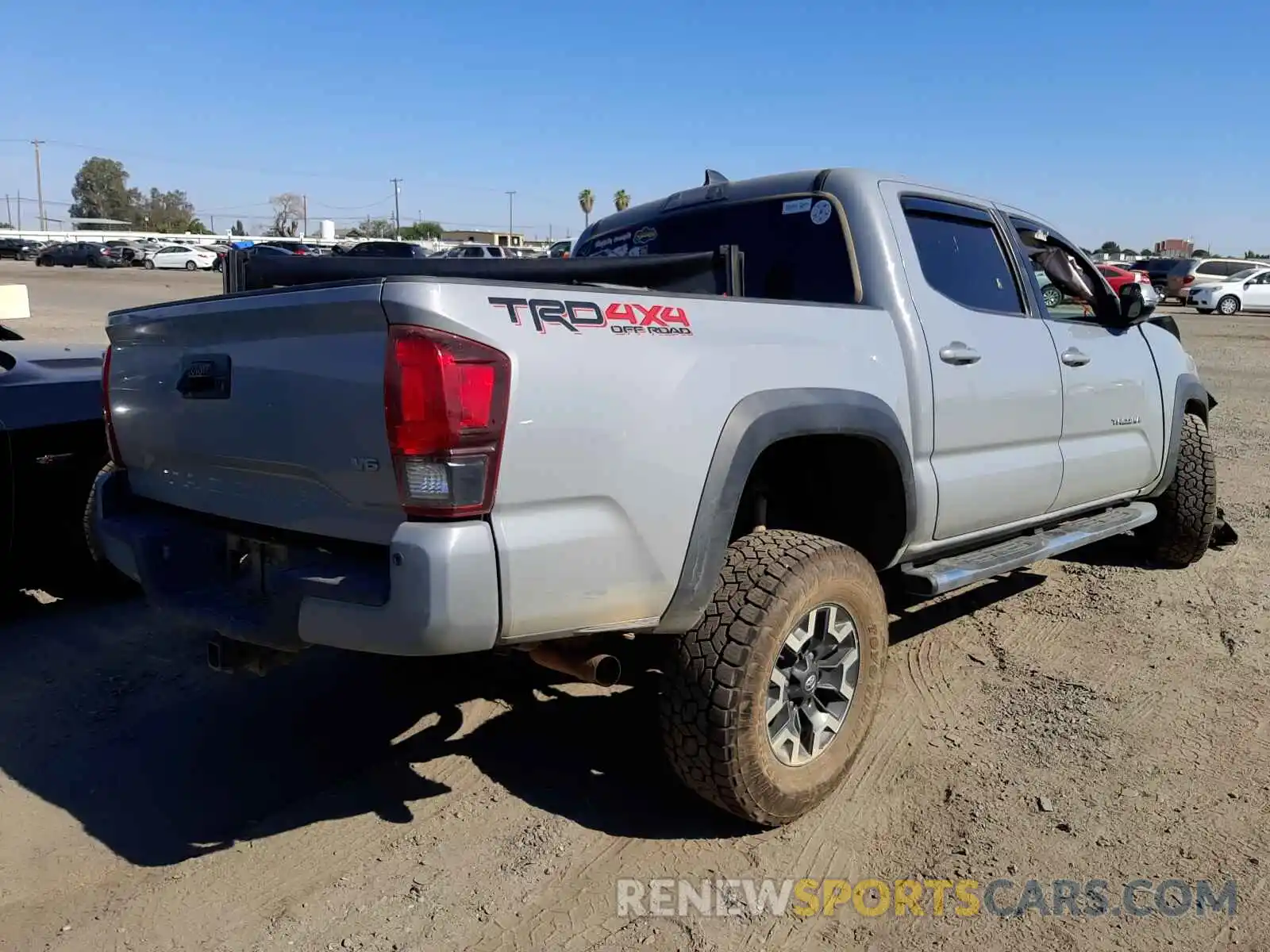 4 Photograph of a damaged car 3TMCZ5AN4KM192100 TOYOTA TACOMA 2019