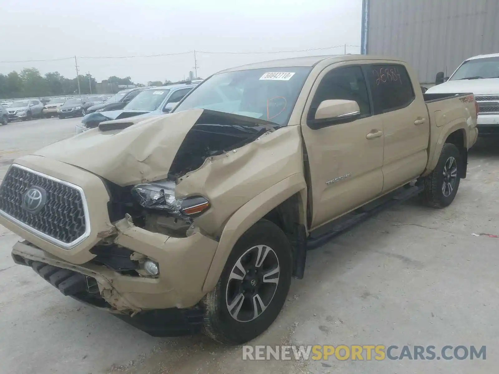 2 Photograph of a damaged car 3TMCZ5AN4KM192260 TOYOTA TACOMA 2019