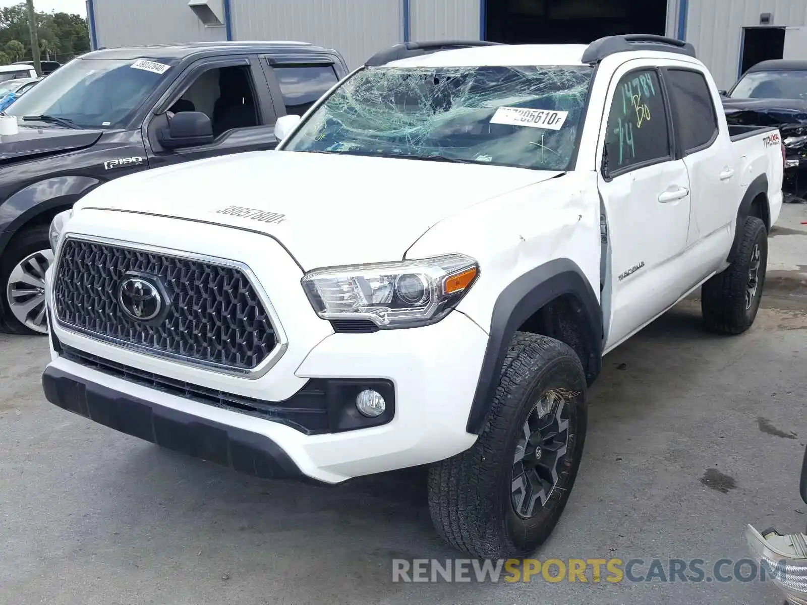 2 Photograph of a damaged car 3TMCZ5AN4KM194428 TOYOTA TACOMA 2019