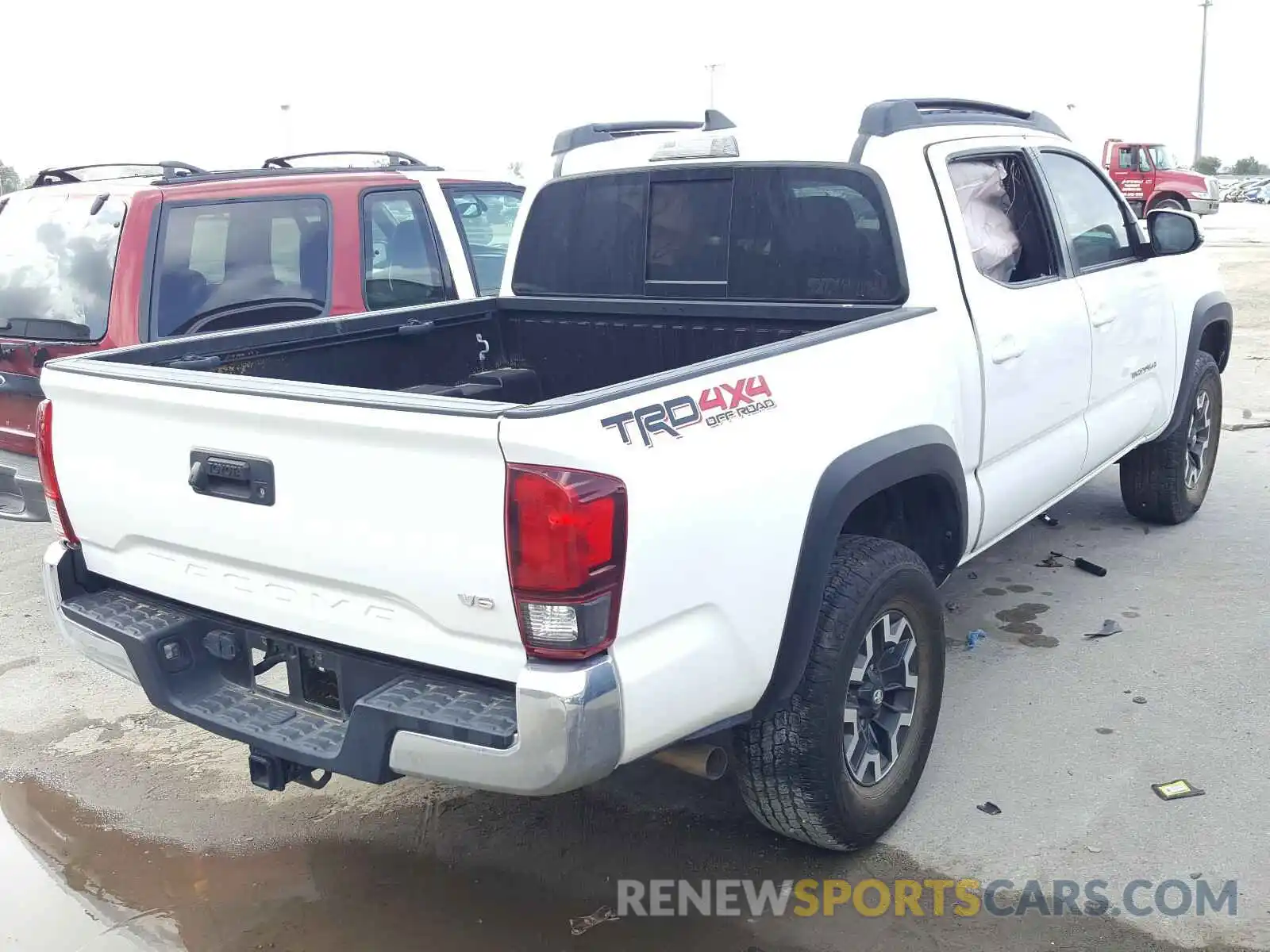 4 Photograph of a damaged car 3TMCZ5AN4KM194428 TOYOTA TACOMA 2019