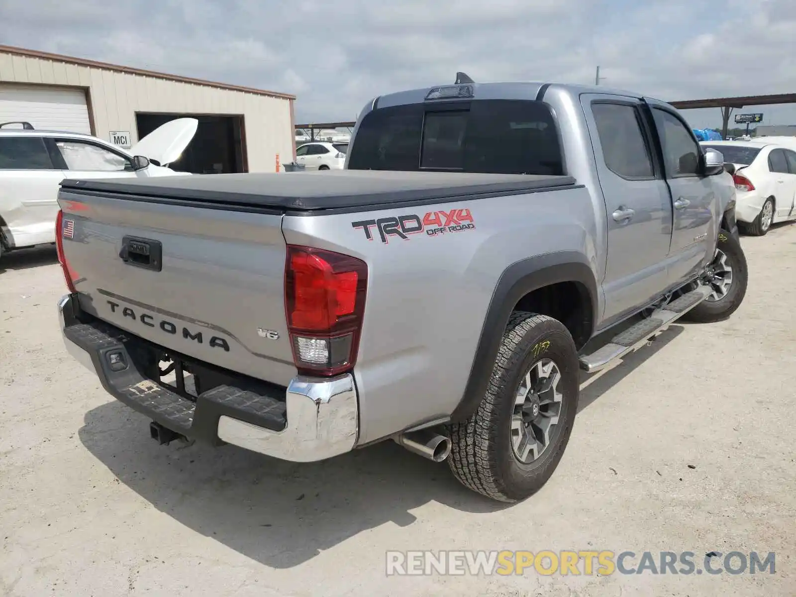 4 Photograph of a damaged car 3TMCZ5AN4KM194641 TOYOTA TACOMA 2019