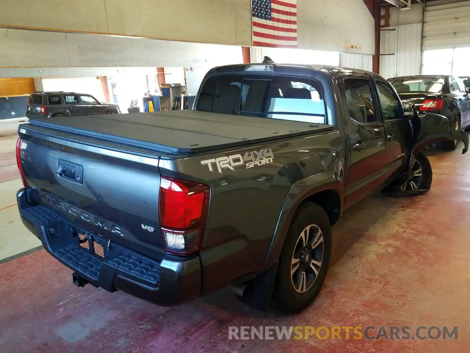 4 Photograph of a damaged car 3TMCZ5AN4KM195918 TOYOTA TACOMA 2019