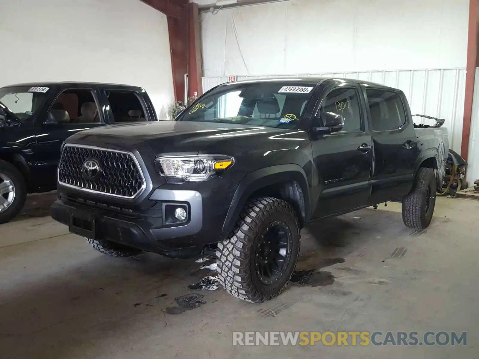 2 Photograph of a damaged car 3TMCZ5AN4KM197359 TOYOTA TACOMA 2019