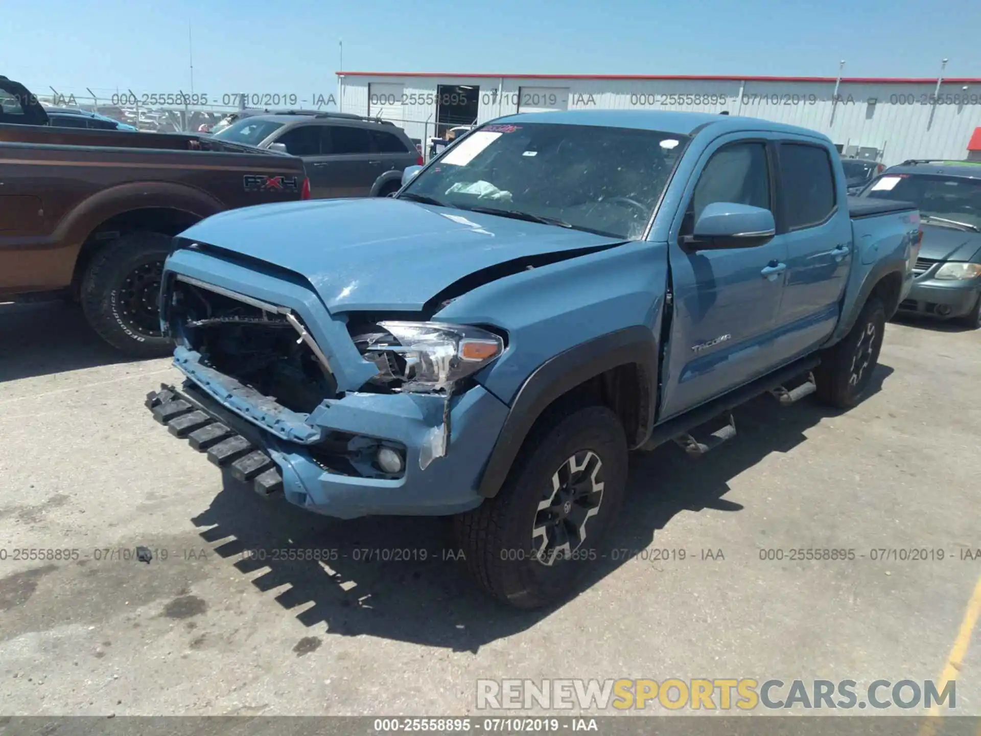 2 Photograph of a damaged car 3TMCZ5AN4KM202303 TOYOTA TACOMA 2019