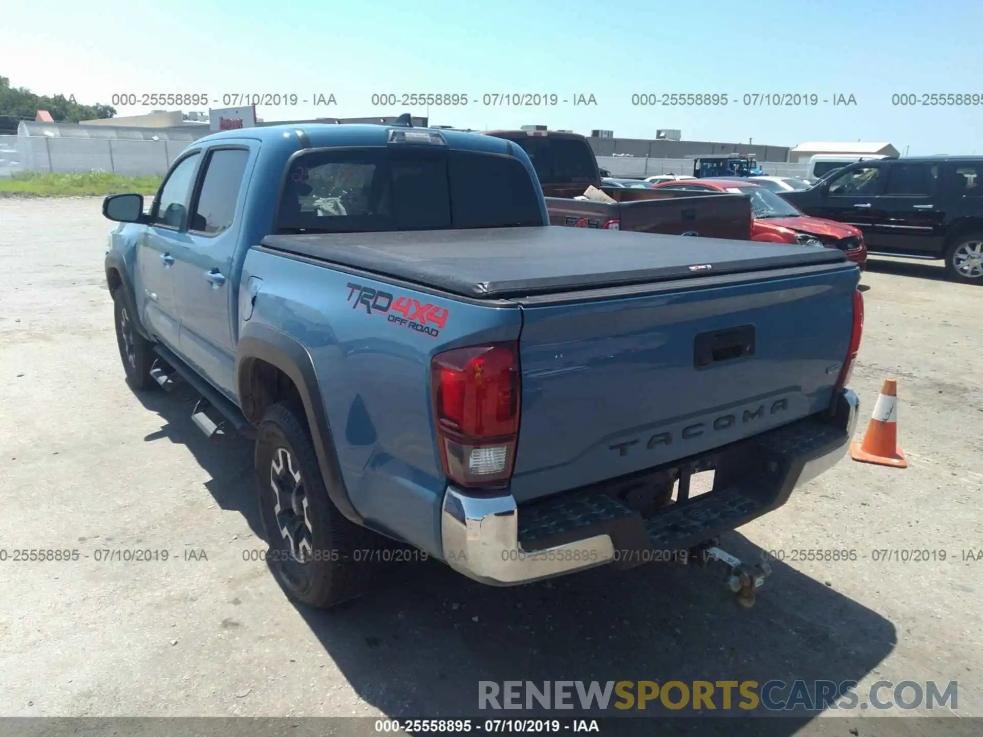 3 Photograph of a damaged car 3TMCZ5AN4KM202303 TOYOTA TACOMA 2019