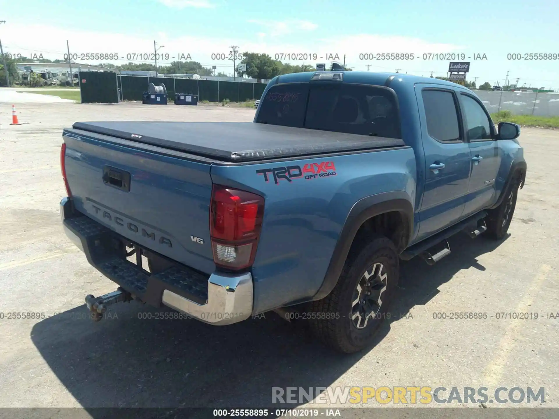 4 Photograph of a damaged car 3TMCZ5AN4KM202303 TOYOTA TACOMA 2019