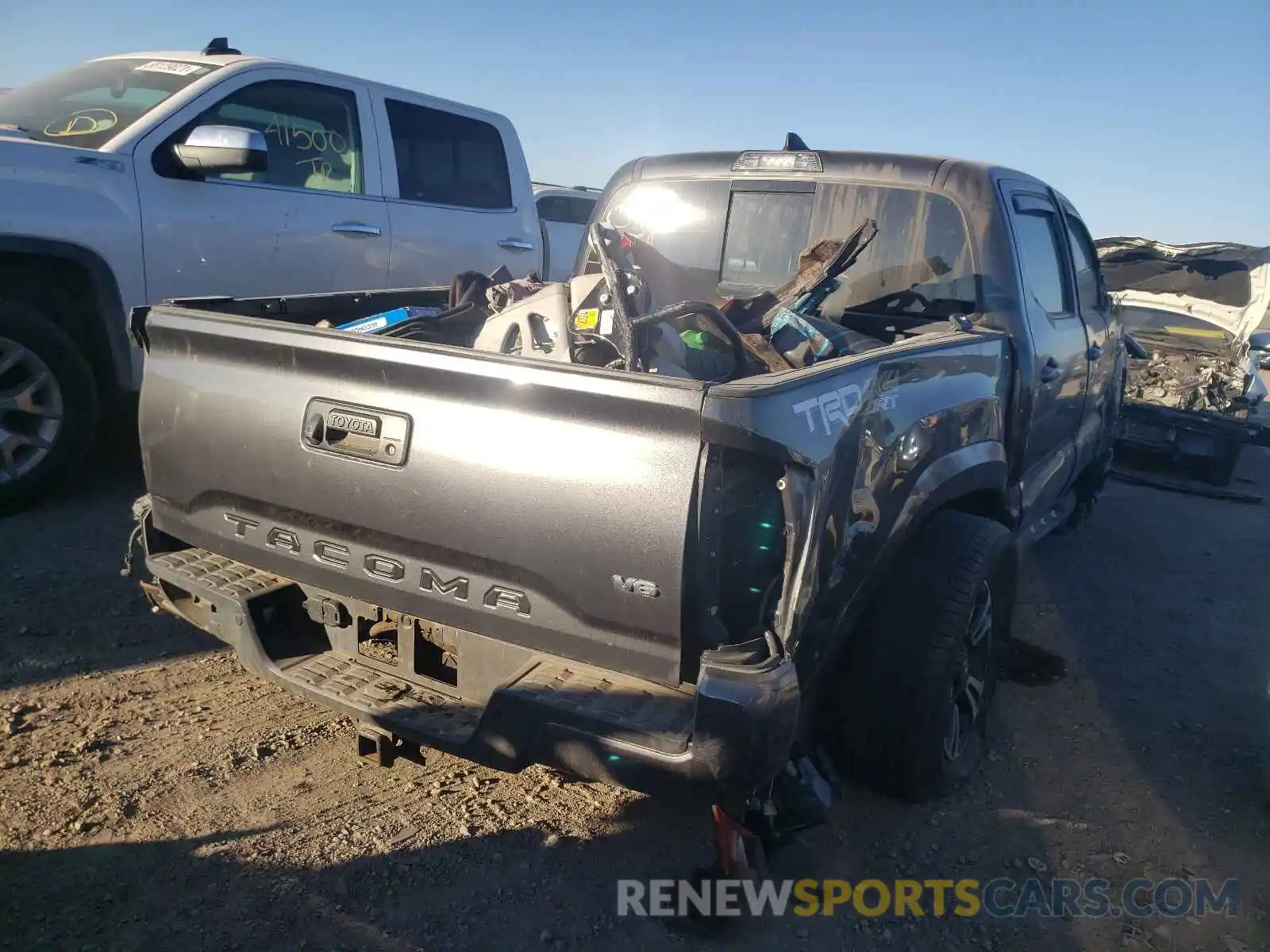 4 Photograph of a damaged car 3TMCZ5AN4KM205038 TOYOTA TACOMA 2019