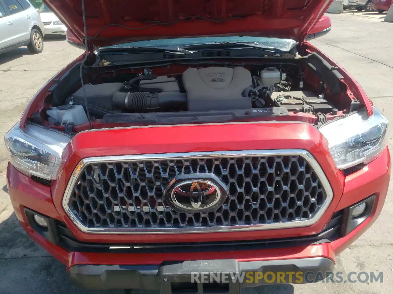 7 Photograph of a damaged car 3TMCZ5AN4KM205590 TOYOTA TACOMA 2019