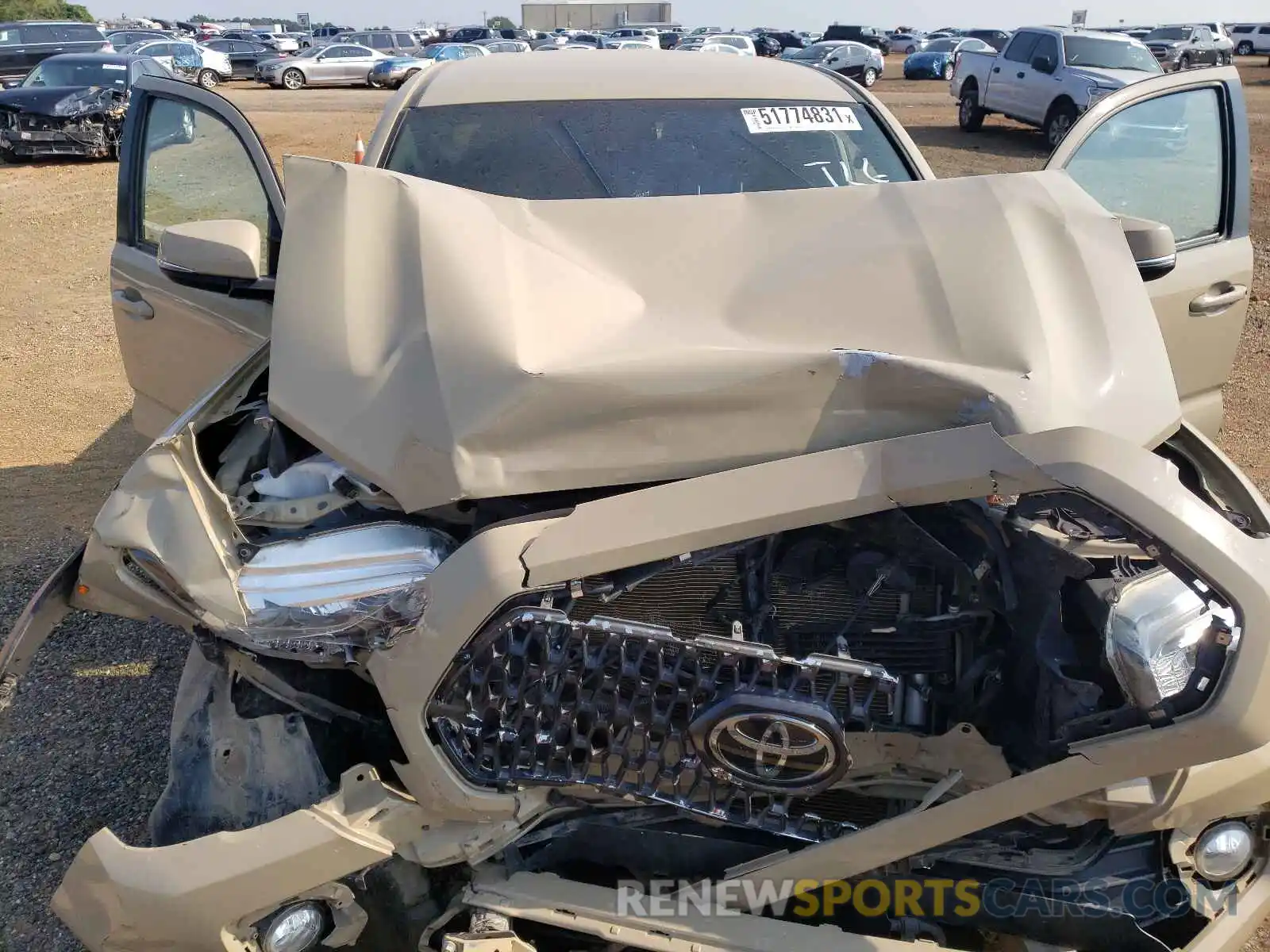 7 Photograph of a damaged car 3TMCZ5AN4KM206125 TOYOTA TACOMA 2019