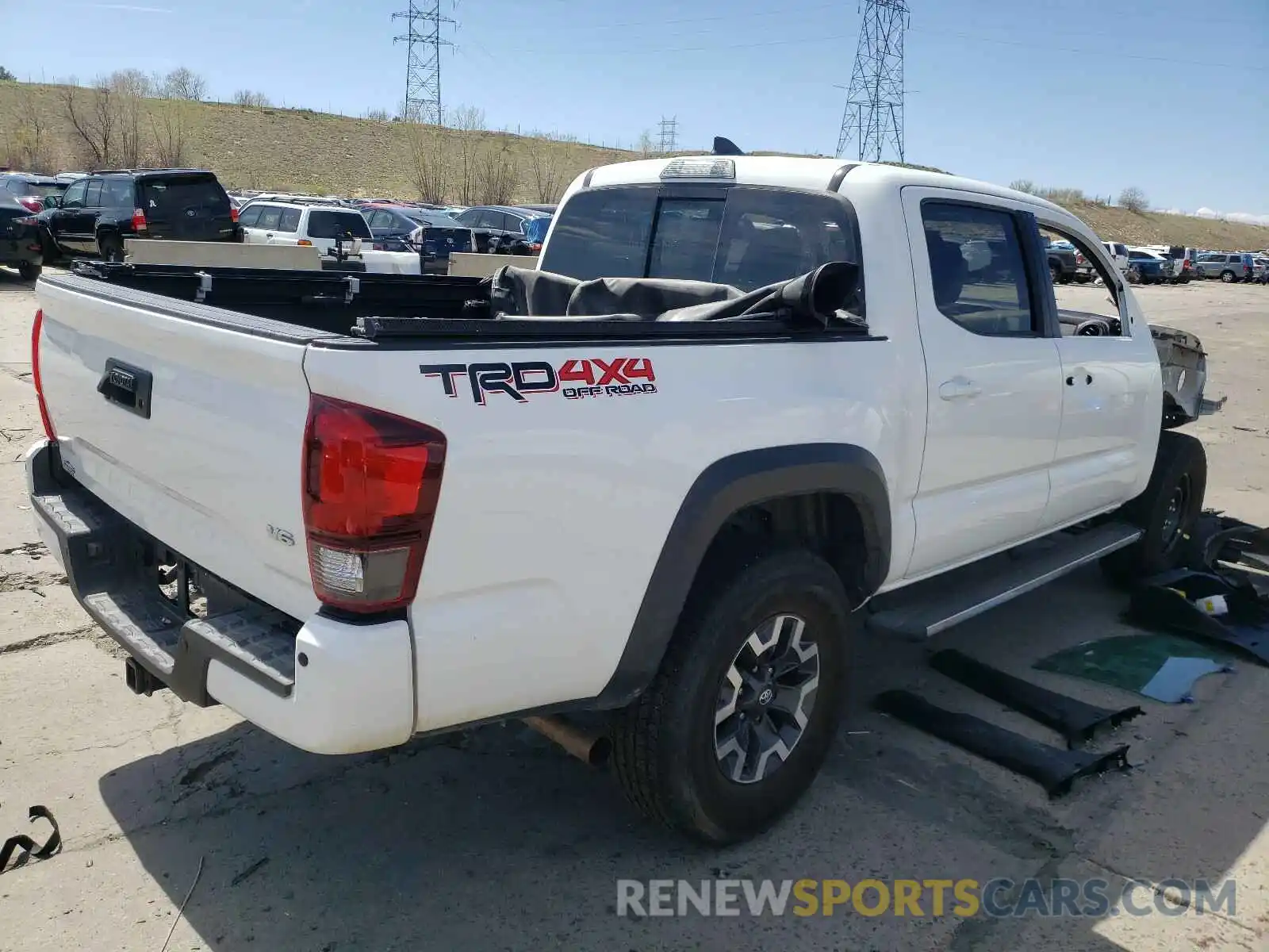 4 Photograph of a damaged car 3TMCZ5AN4KM206982 TOYOTA TACOMA 2019