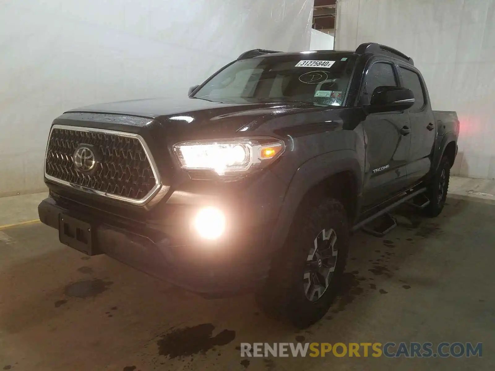 2 Photograph of a damaged car 3TMCZ5AN4KM208053 TOYOTA TACOMA 2019