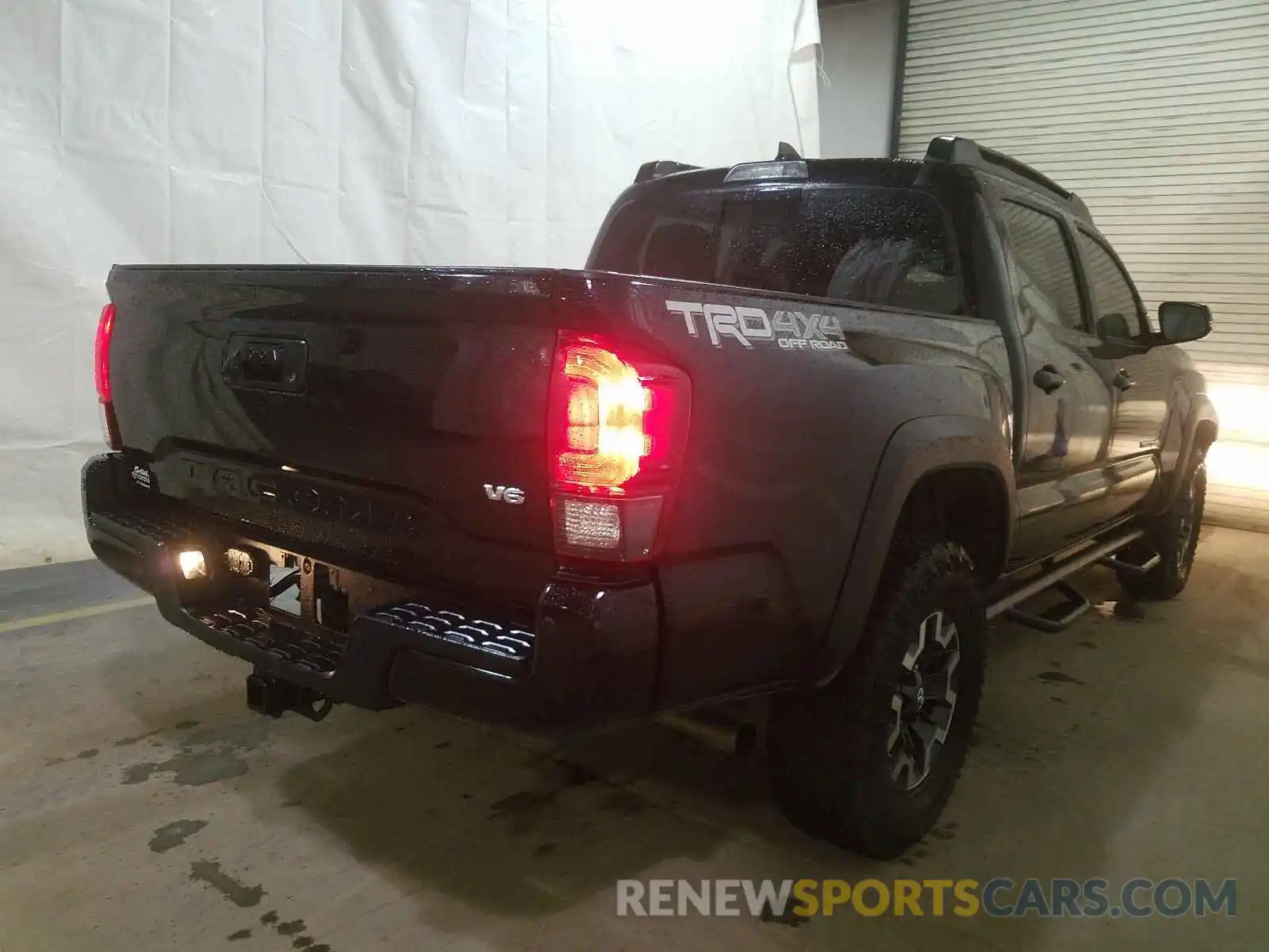 4 Photograph of a damaged car 3TMCZ5AN4KM208053 TOYOTA TACOMA 2019