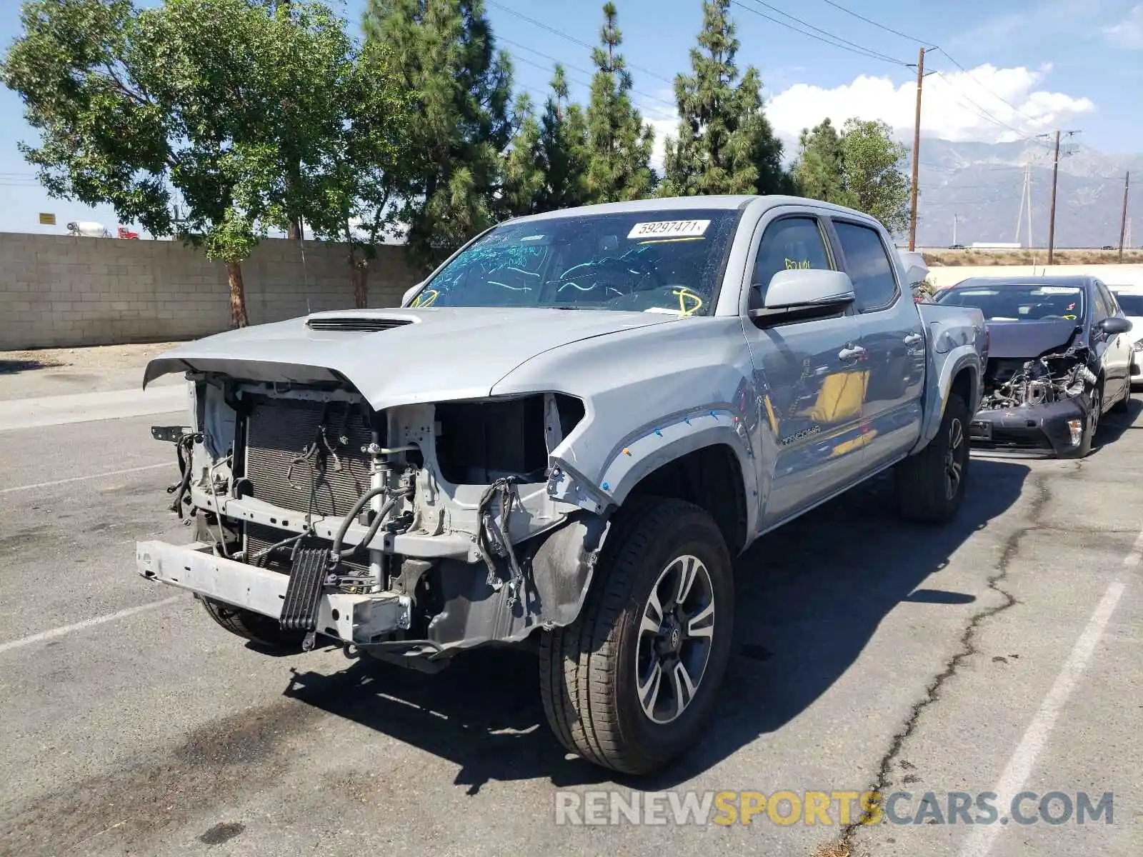 2 Photograph of a damaged car 3TMCZ5AN4KM215729 TOYOTA TACOMA 2019