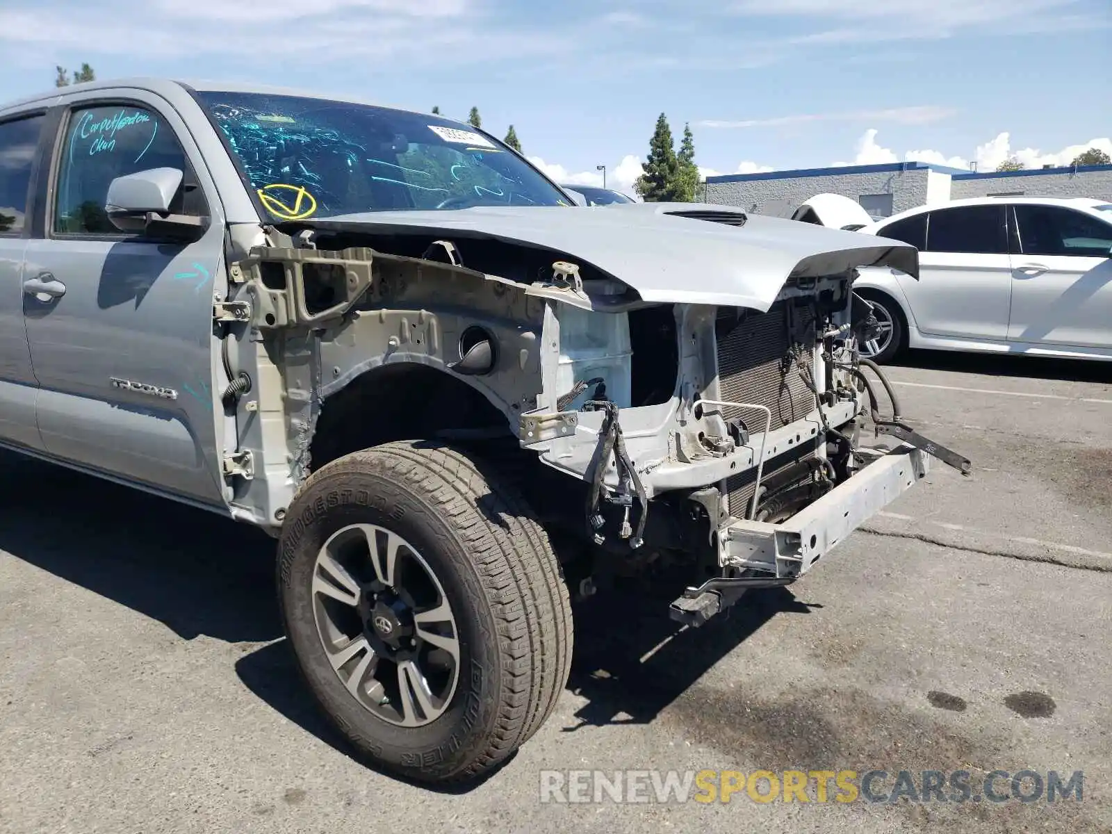 9 Photograph of a damaged car 3TMCZ5AN4KM215729 TOYOTA TACOMA 2019