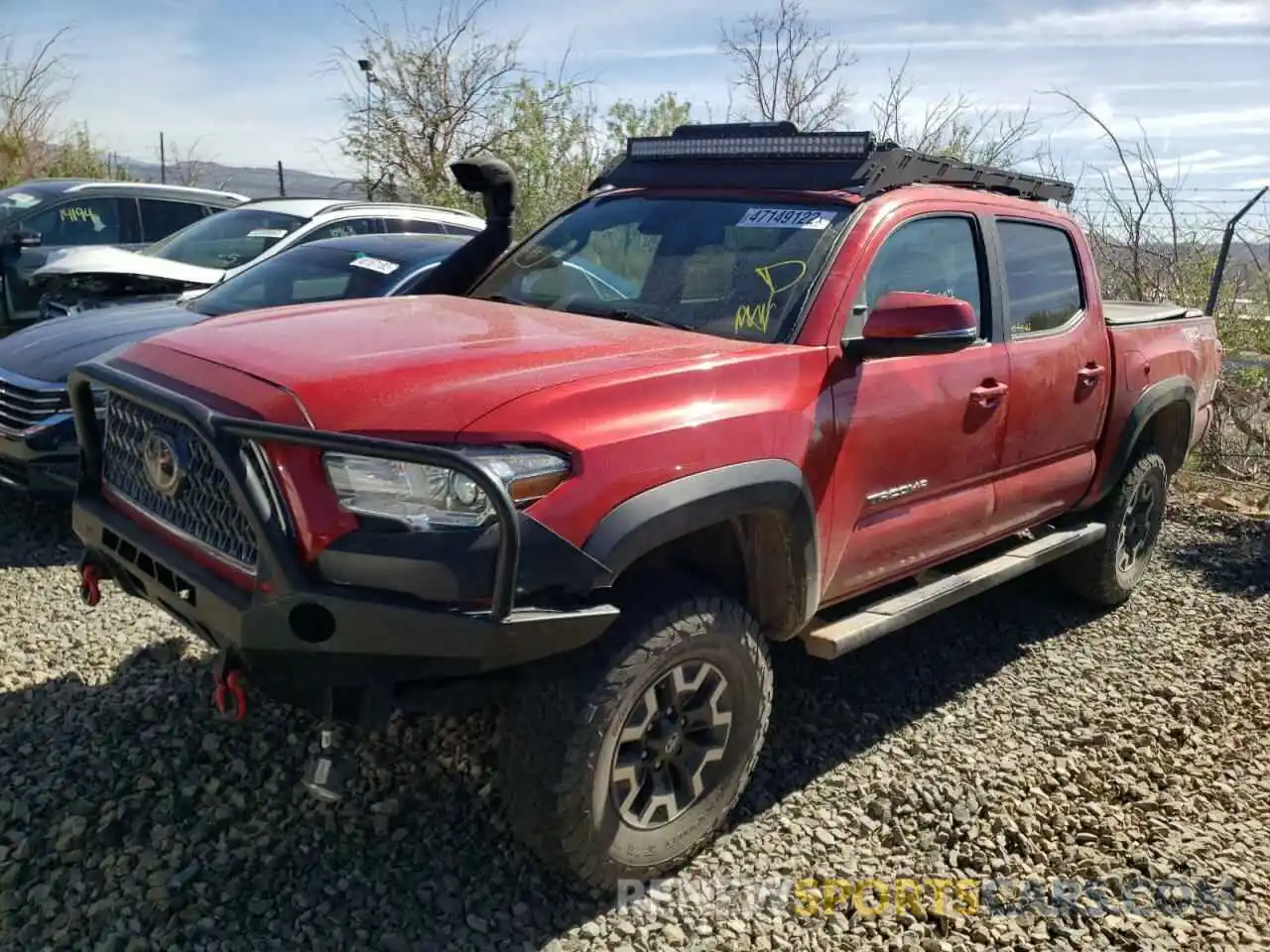 2 Photograph of a damaged car 3TMCZ5AN4KM218310 TOYOTA TACOMA 2019