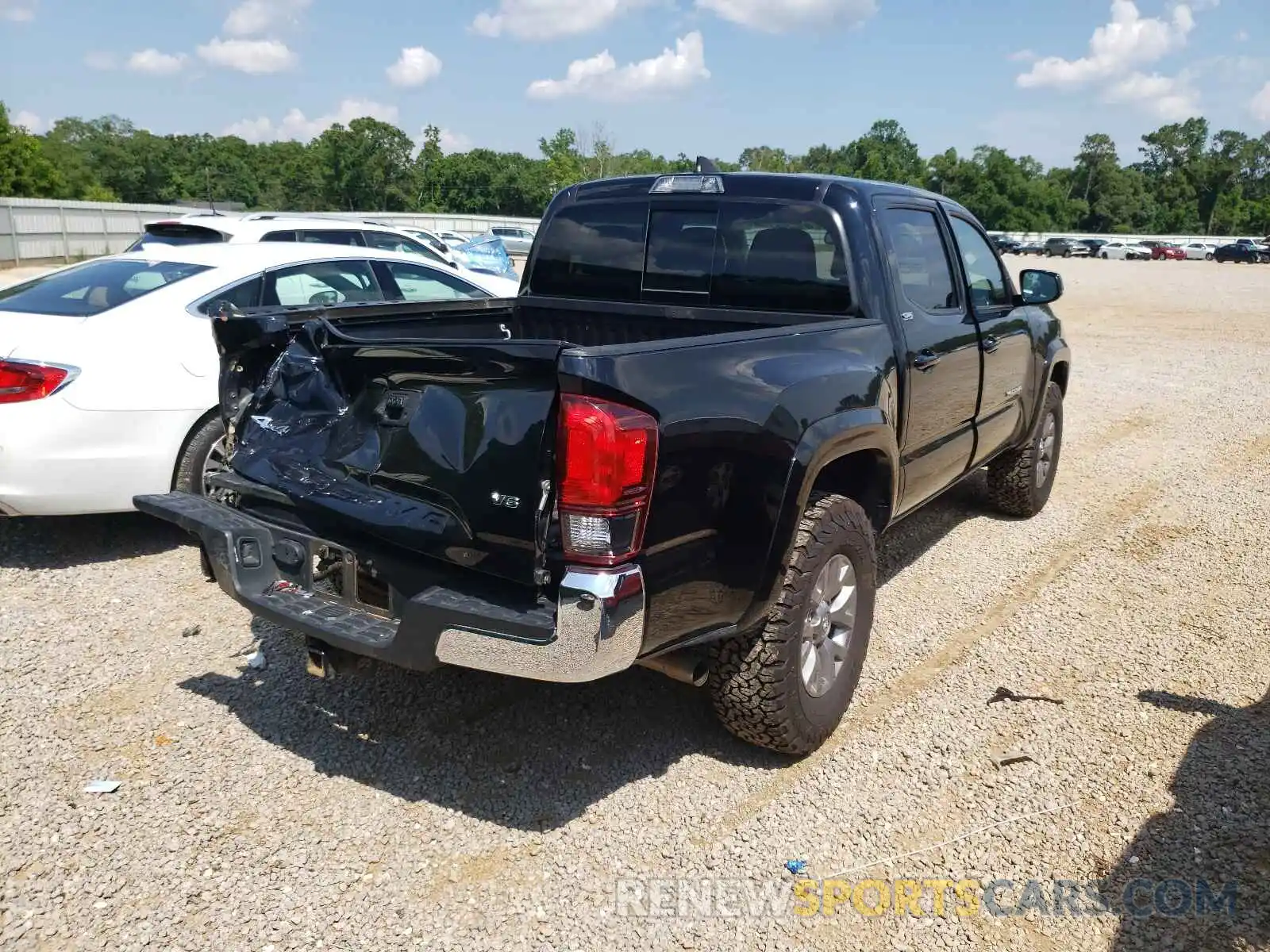 4 Photograph of a damaged car 3TMCZ5AN4KM218890 TOYOTA TACOMA 2019