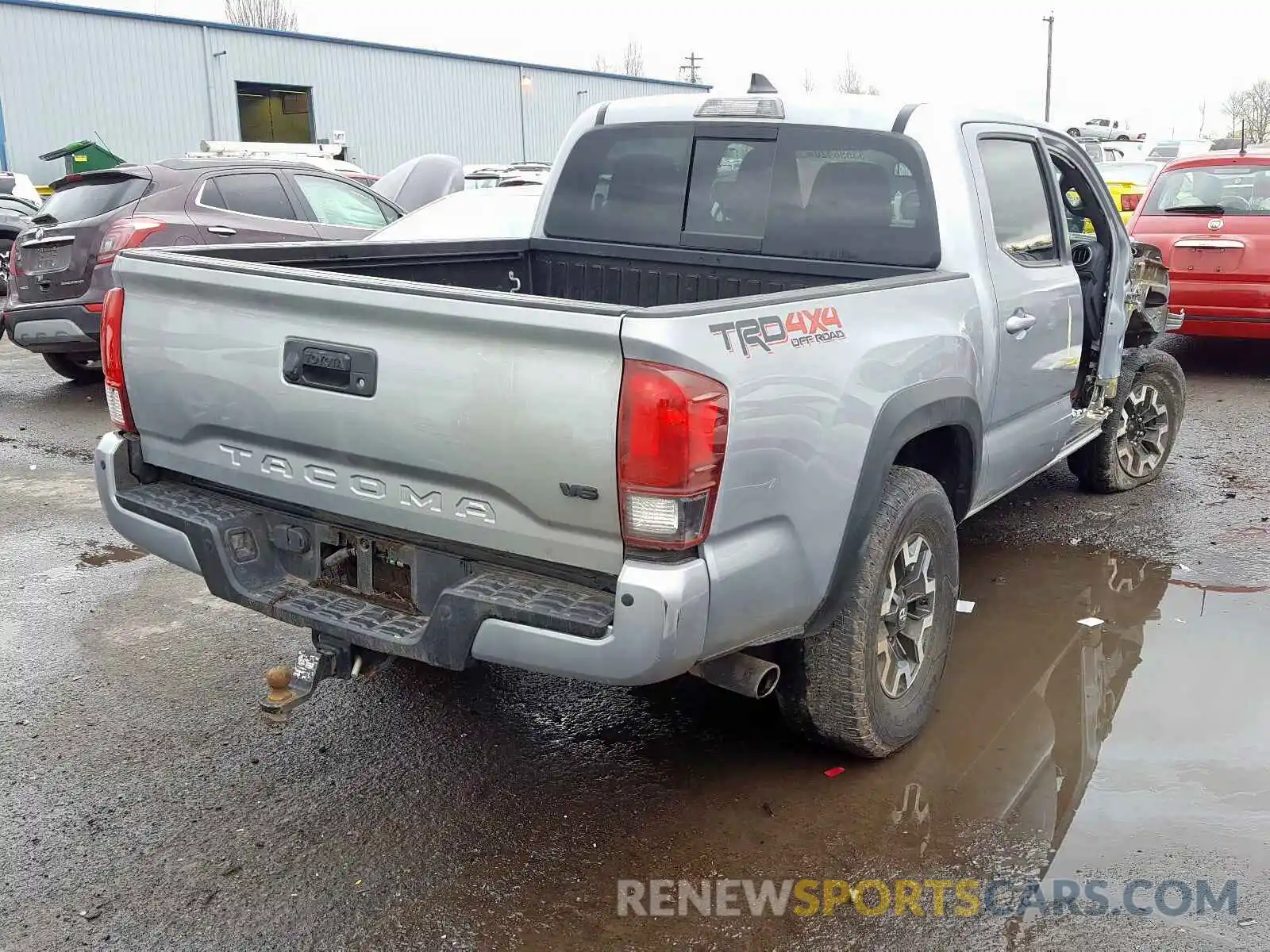 4 Photograph of a damaged car 3TMCZ5AN4KM220669 TOYOTA TACOMA 2019