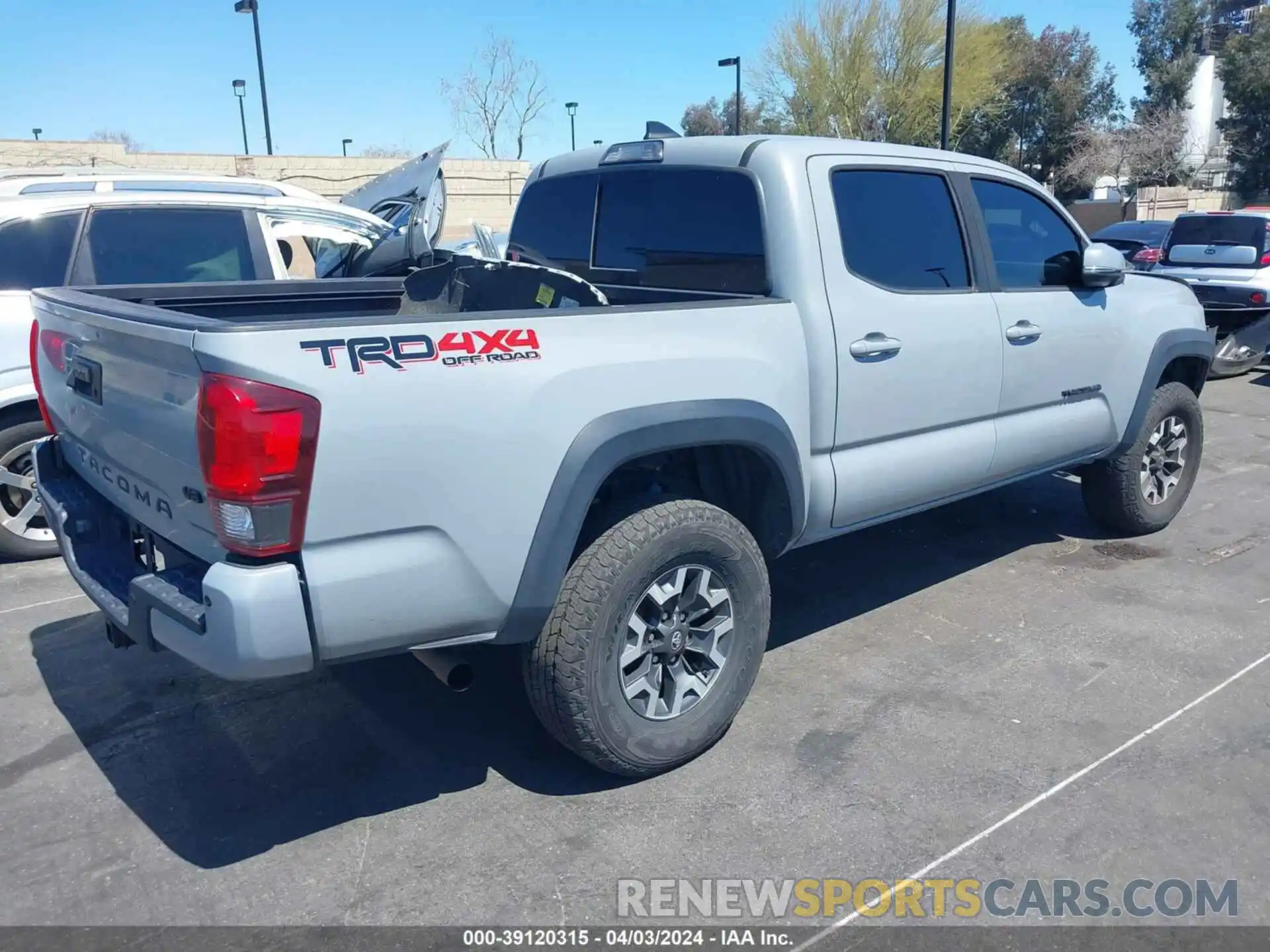 4 Photograph of a damaged car 3TMCZ5AN4KM222163 TOYOTA TACOMA 2019