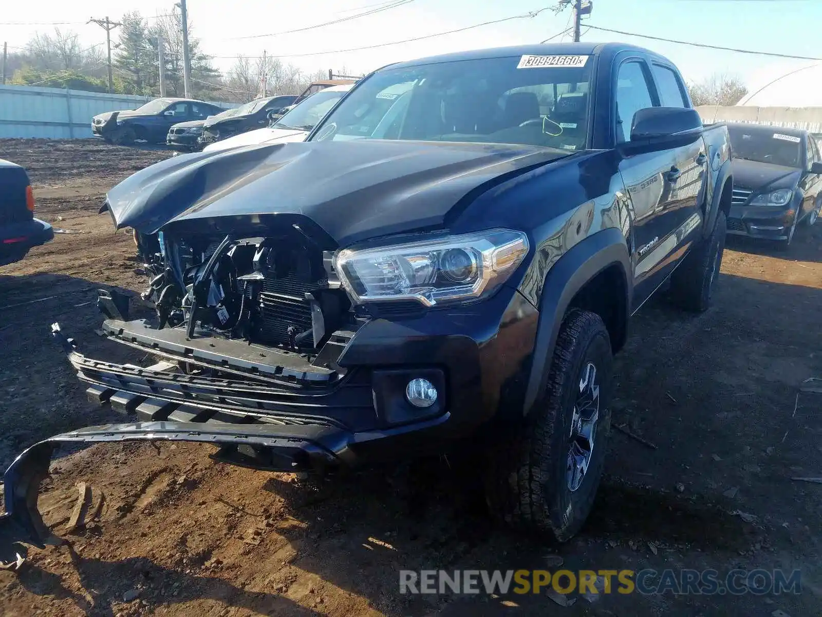 2 Photograph of a damaged car 3TMCZ5AN4KM222471 TOYOTA TACOMA 2019