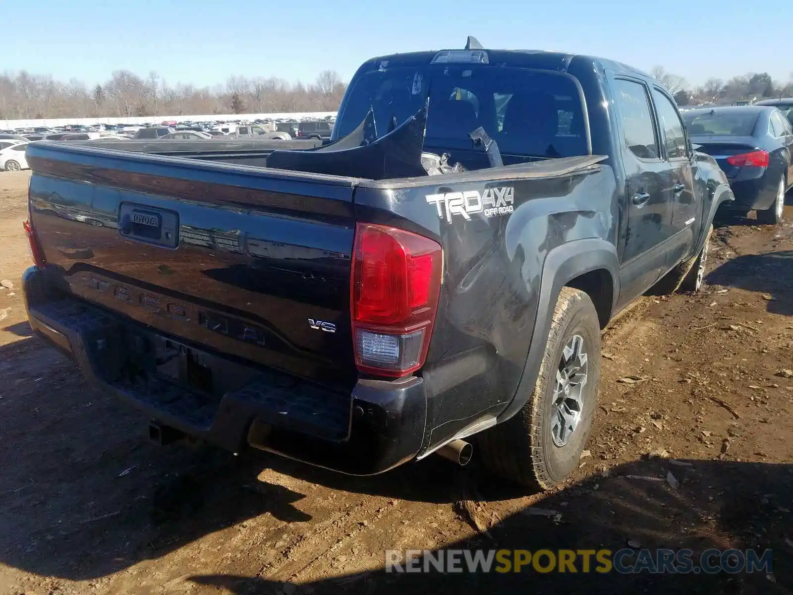 4 Photograph of a damaged car 3TMCZ5AN4KM222471 TOYOTA TACOMA 2019