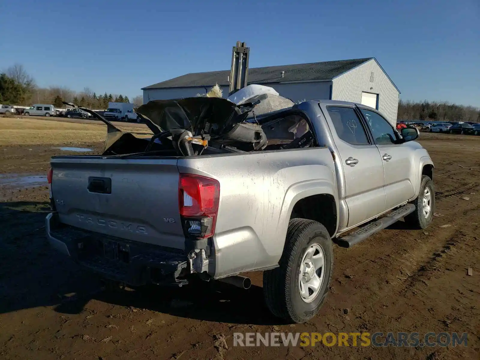 4 Photograph of a damaged car 3TMCZ5AN4KM224107 TOYOTA TACOMA 2019