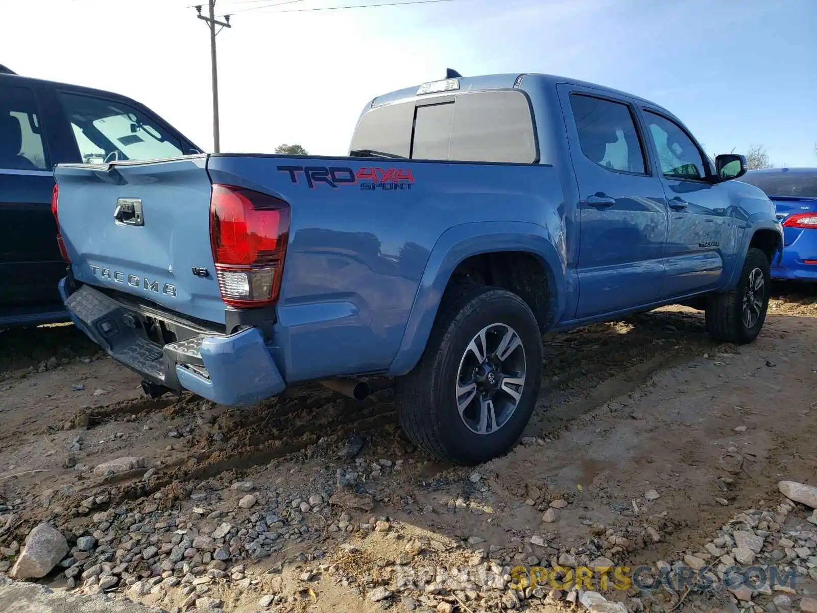 4 Photograph of a damaged car 3TMCZ5AN4KM225631 TOYOTA TACOMA 2019