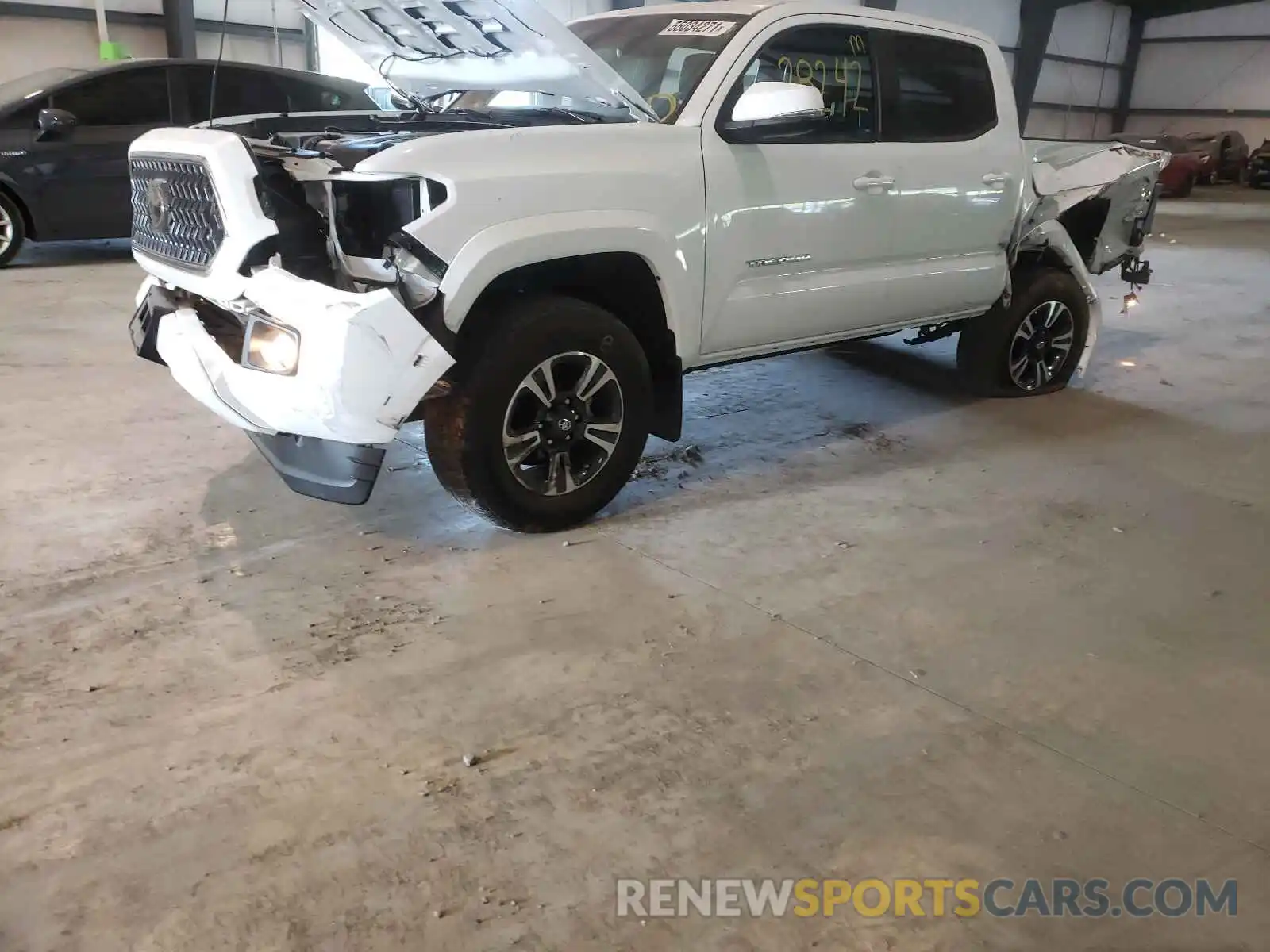 9 Photograph of a damaged car 3TMCZ5AN4KM226472 TOYOTA TACOMA 2019