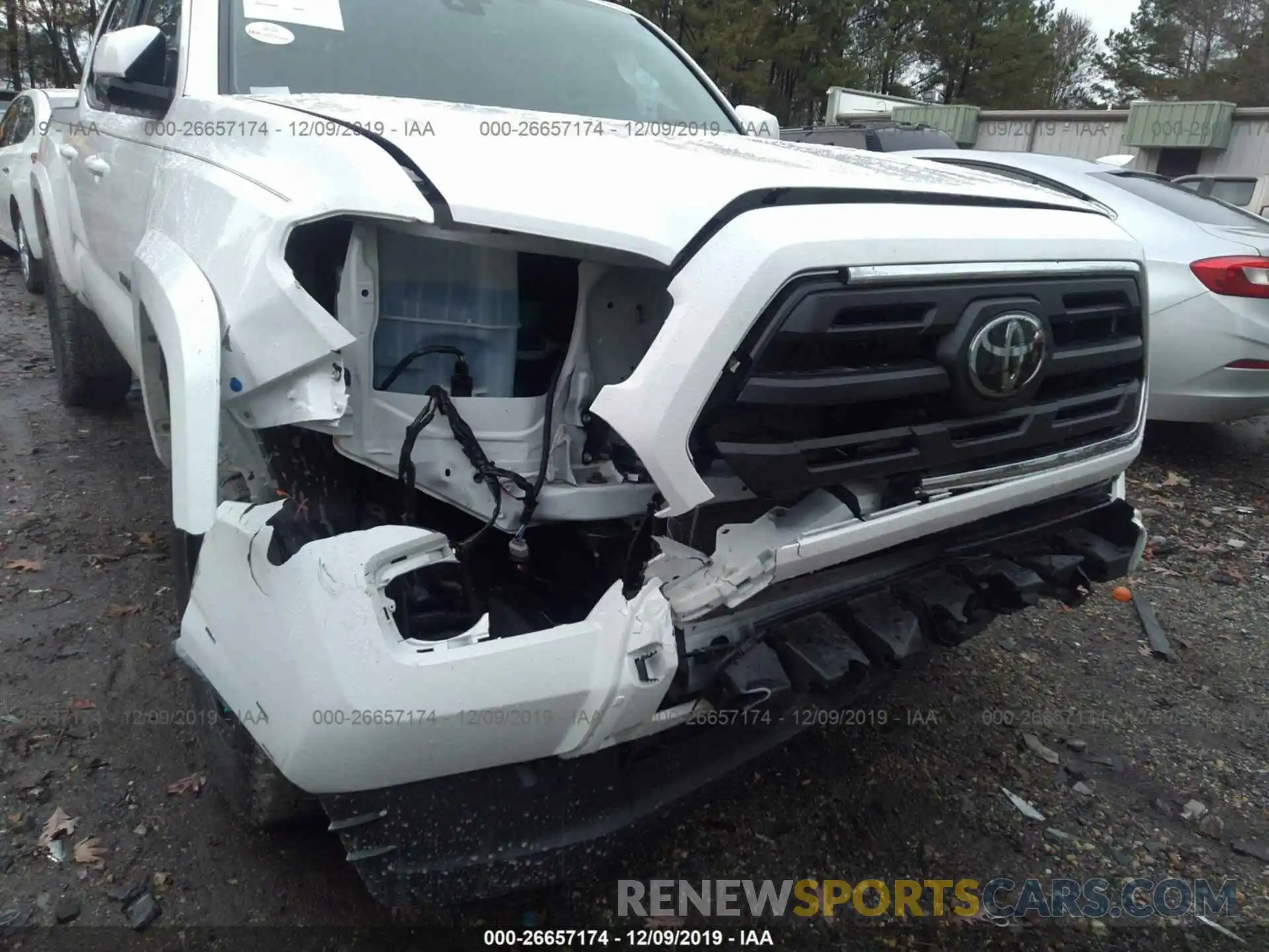 6 Photograph of a damaged car 3TMCZ5AN4KM228139 TOYOTA TACOMA 2019