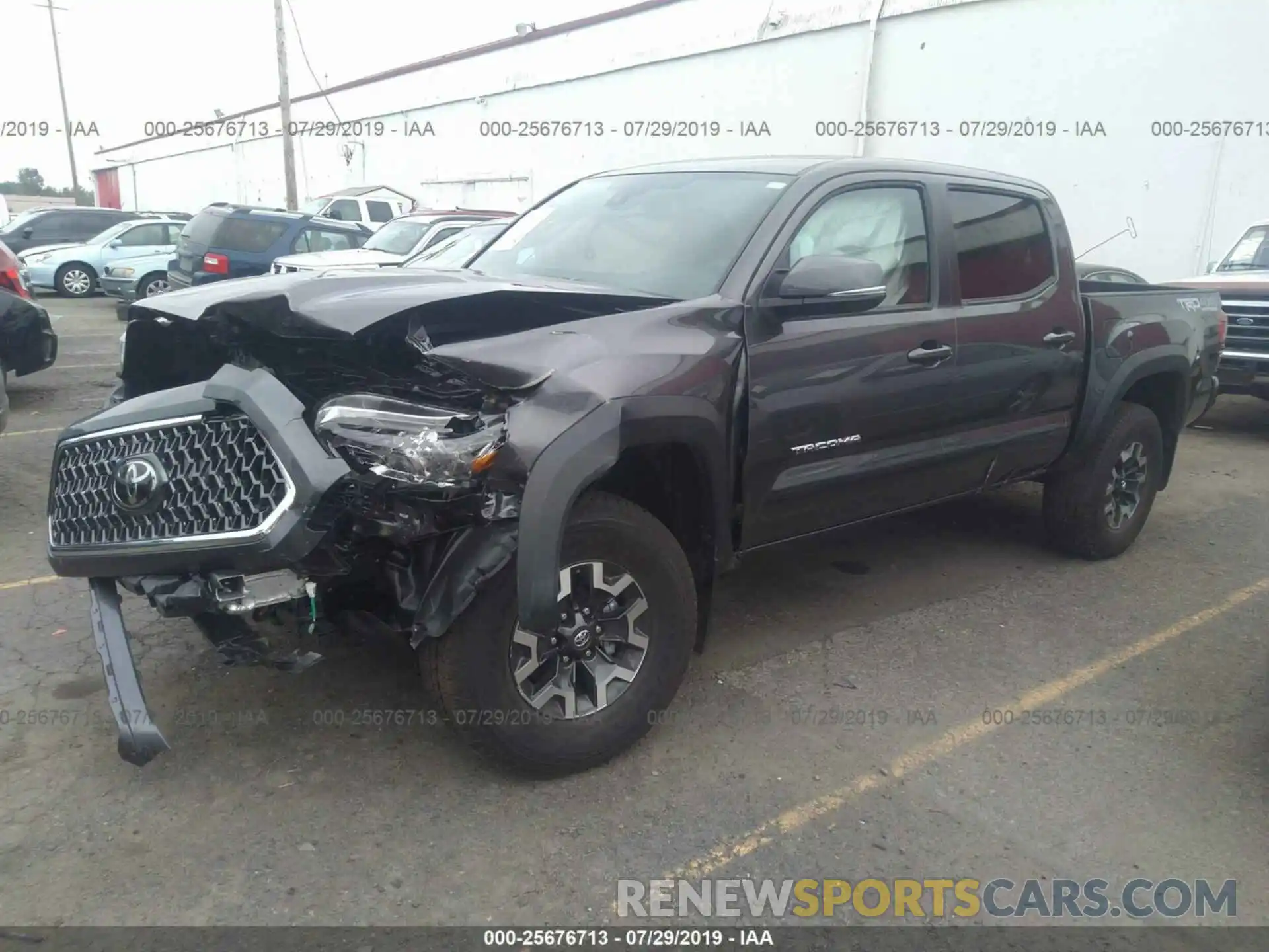 2 Photograph of a damaged car 3TMCZ5AN4KM228187 TOYOTA TACOMA 2019