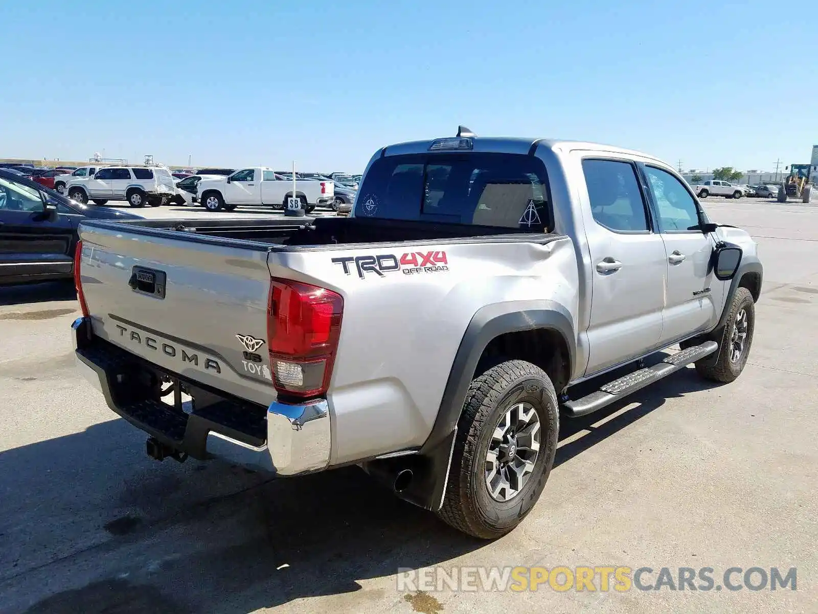 4 Photograph of a damaged car 3TMCZ5AN4KM230327 TOYOTA TACOMA 2019