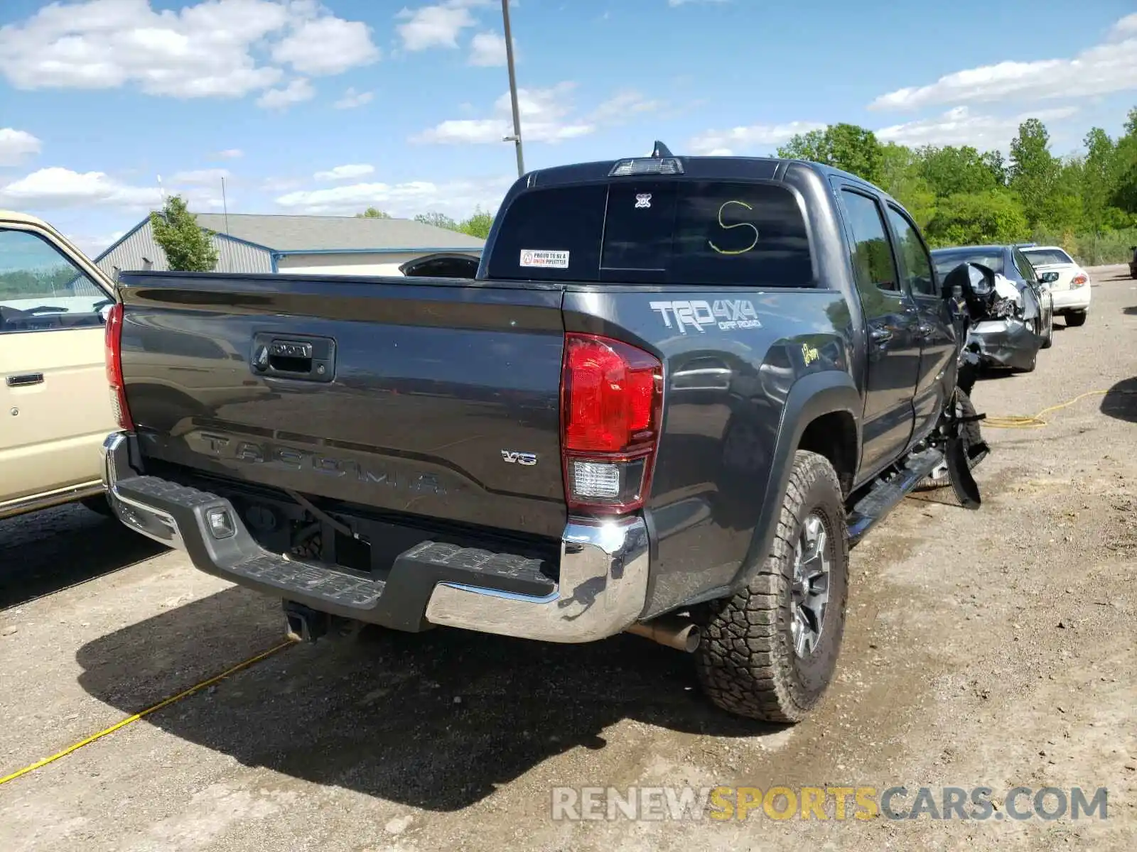 4 Photograph of a damaged car 3TMCZ5AN4KM230568 TOYOTA TACOMA 2019