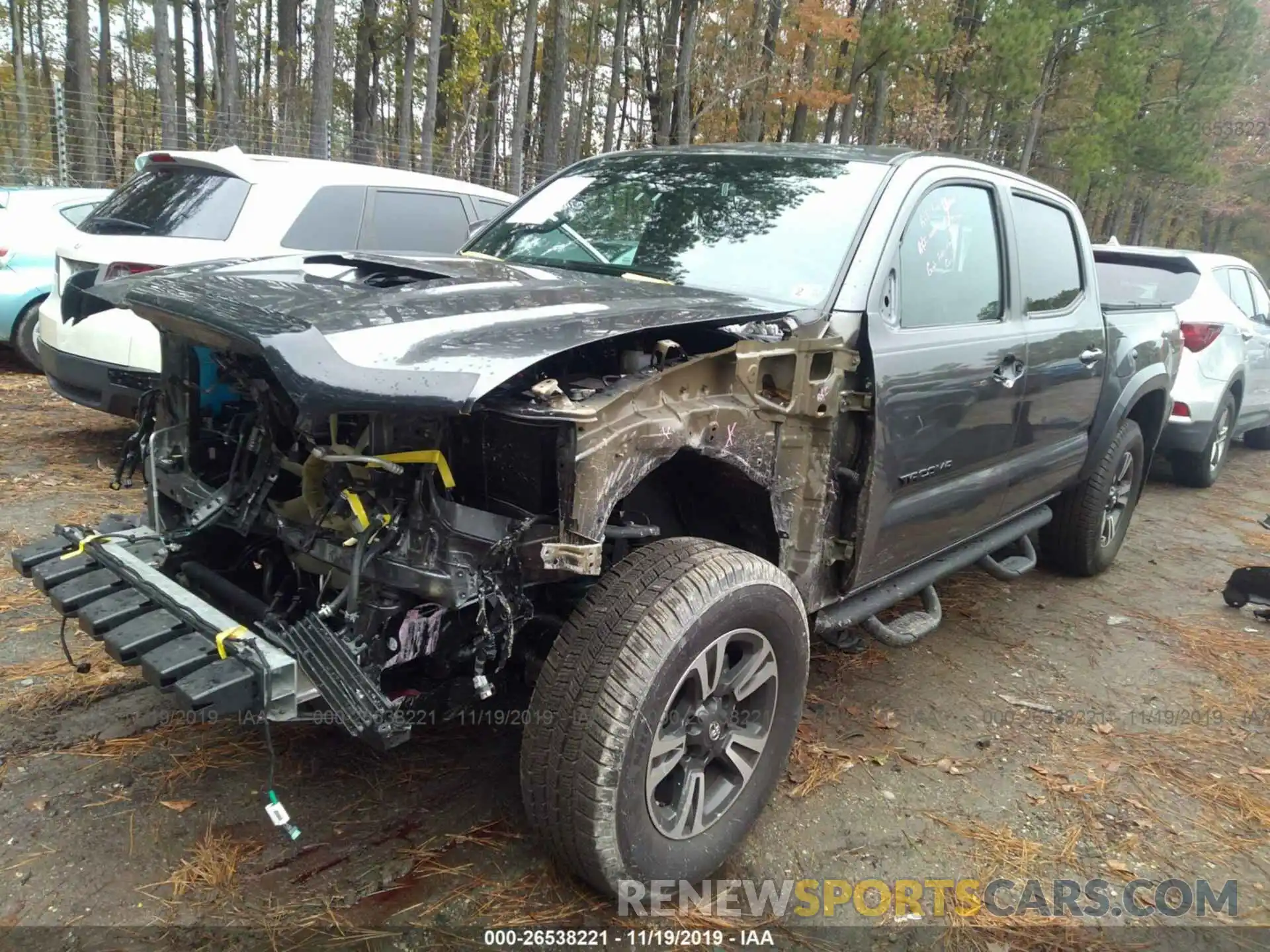 2 Photograph of a damaged car 3TMCZ5AN4KM231381 TOYOTA TACOMA 2019