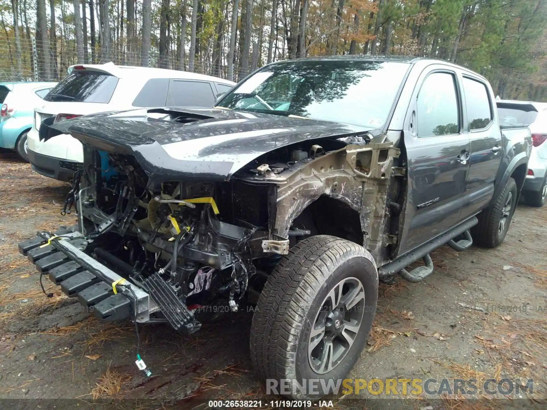 6 Photograph of a damaged car 3TMCZ5AN4KM231381 TOYOTA TACOMA 2019