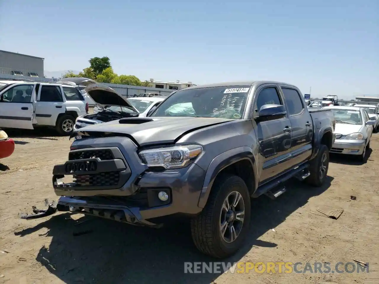 2 Photograph of a damaged car 3TMCZ5AN4KM235009 TOYOTA TACOMA 2019