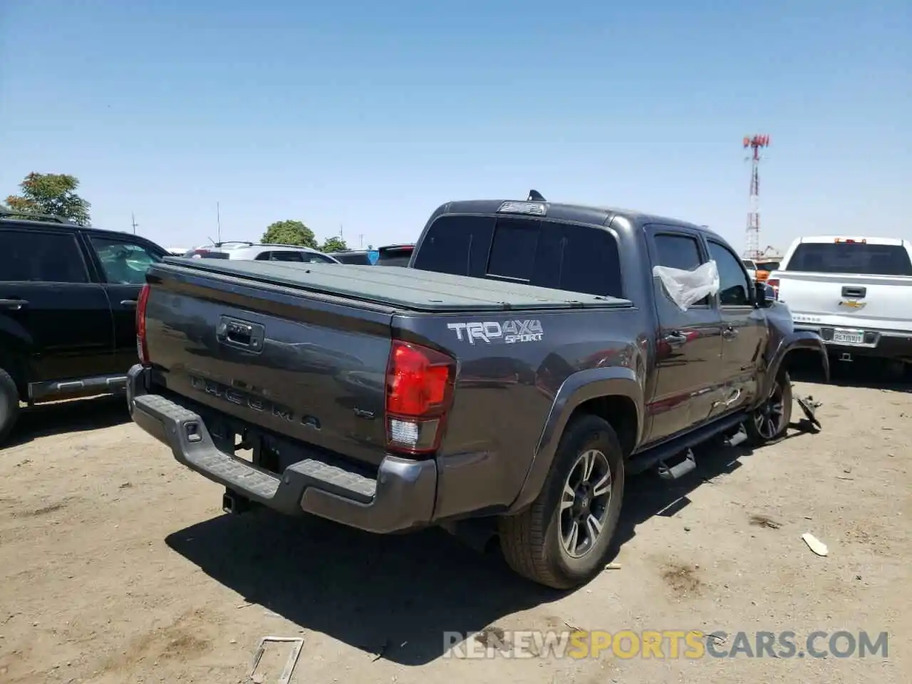 4 Photograph of a damaged car 3TMCZ5AN4KM235009 TOYOTA TACOMA 2019