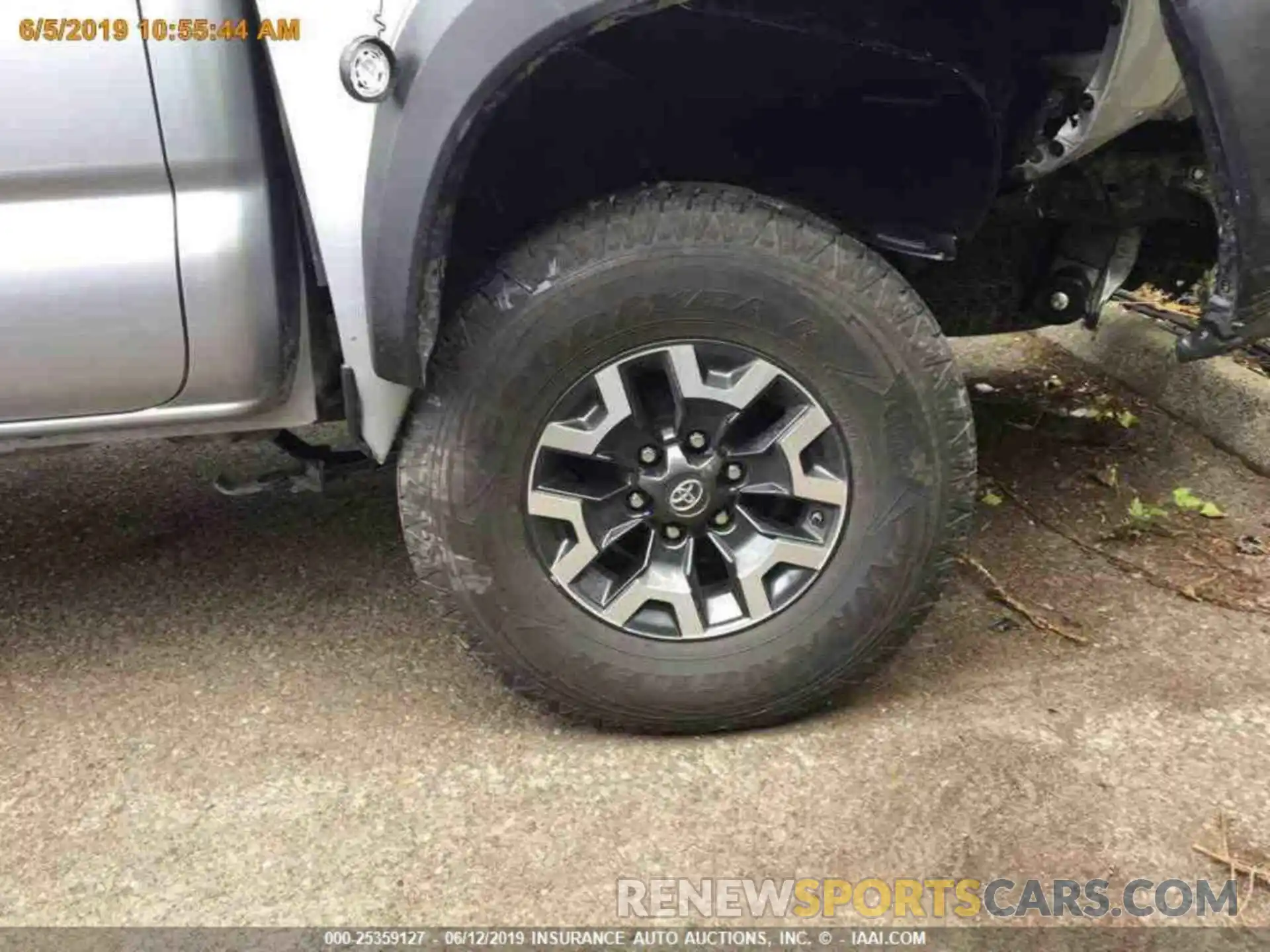 11 Photograph of a damaged car 3TMCZ5AN4KM235298 TOYOTA TACOMA 2019