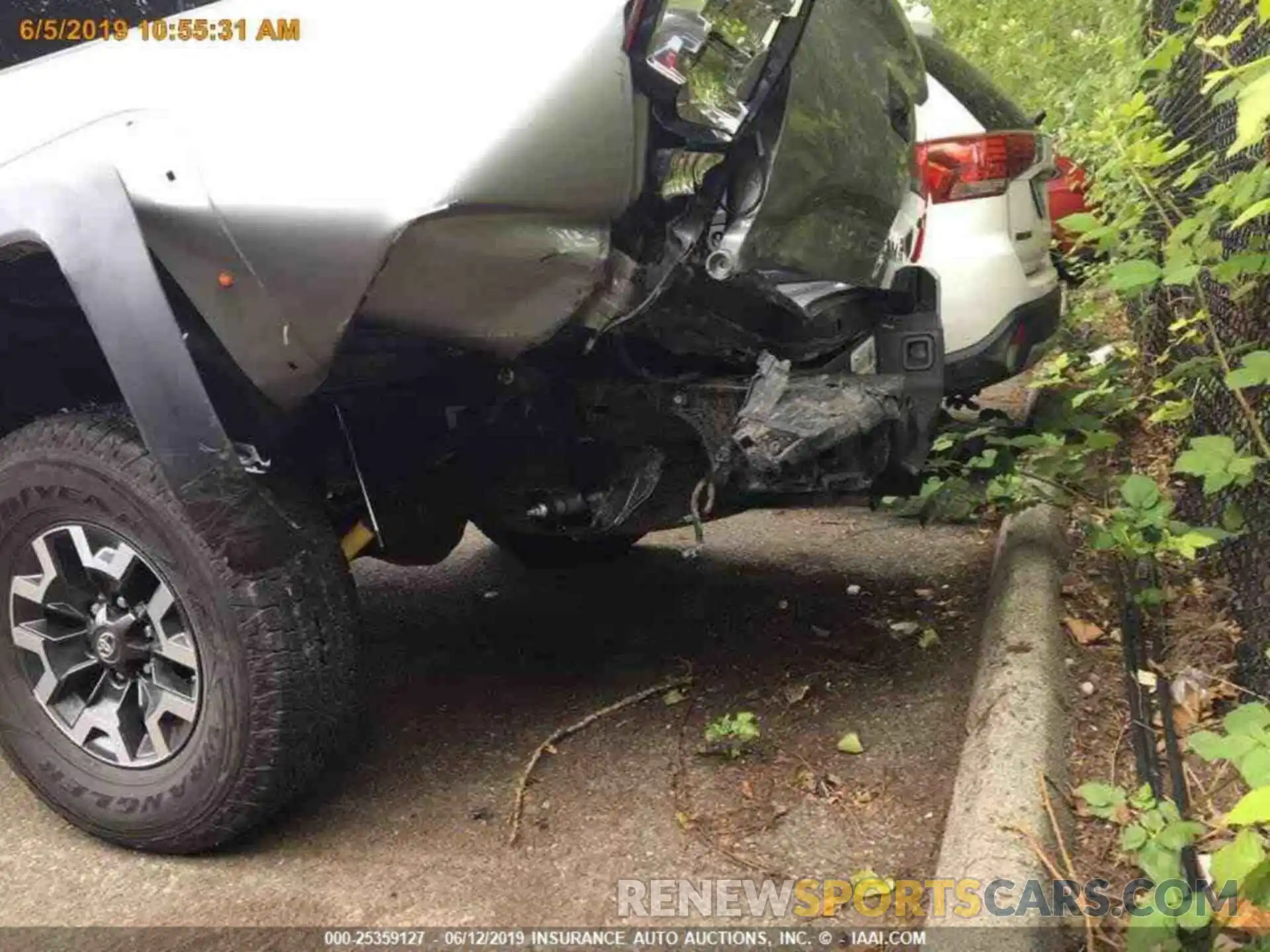 12 Photograph of a damaged car 3TMCZ5AN4KM235298 TOYOTA TACOMA 2019