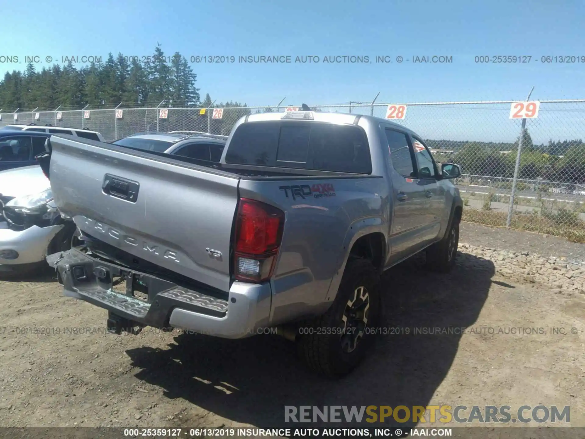 4 Photograph of a damaged car 3TMCZ5AN4KM235298 TOYOTA TACOMA 2019