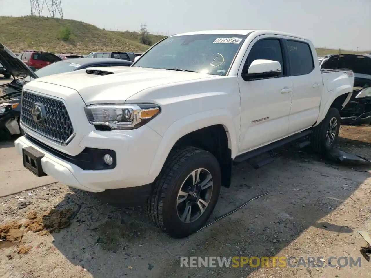 2 Photograph of a damaged car 3TMCZ5AN4KM236077 TOYOTA TACOMA 2019